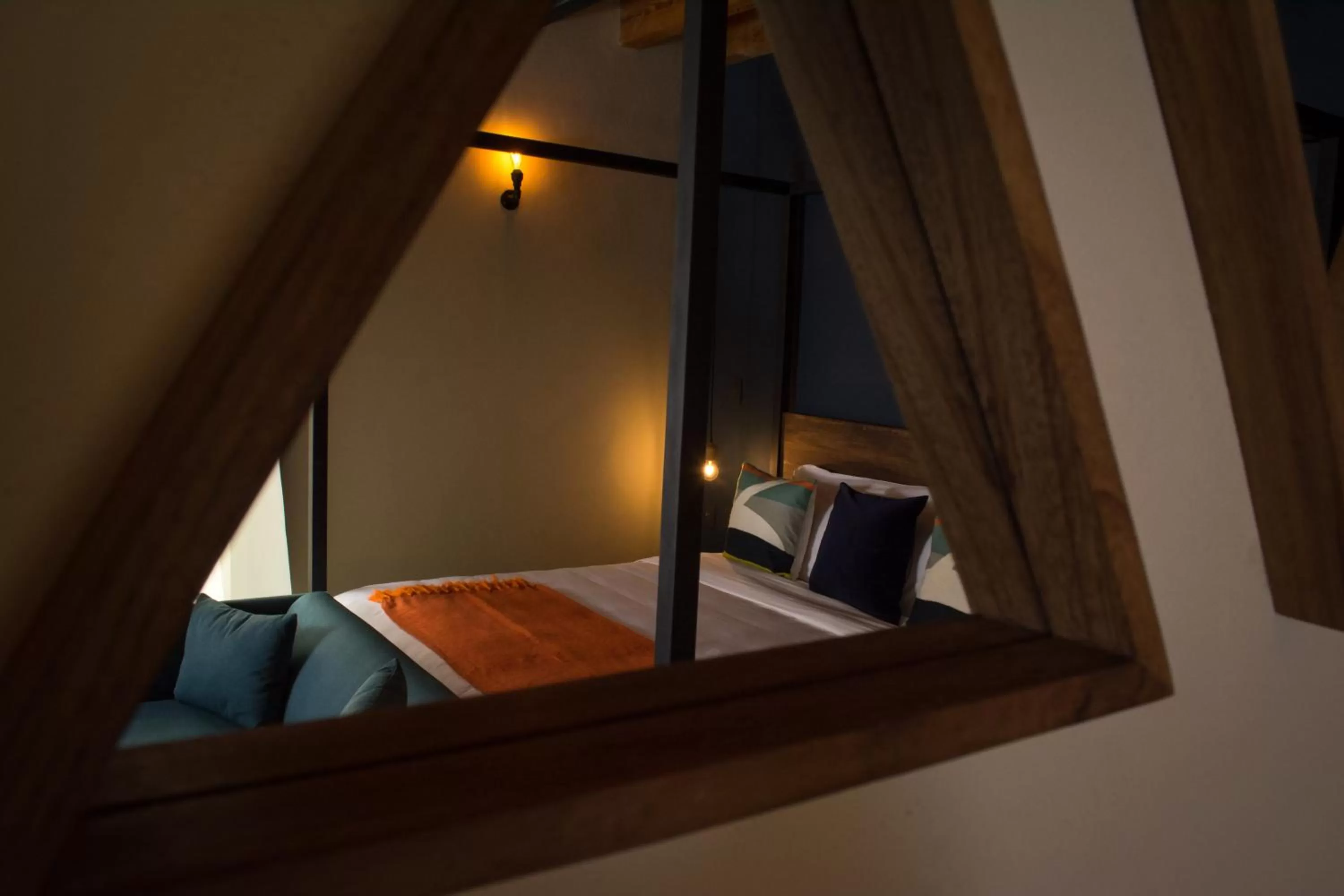 Bed in Antigua Trece Hotel Fusión