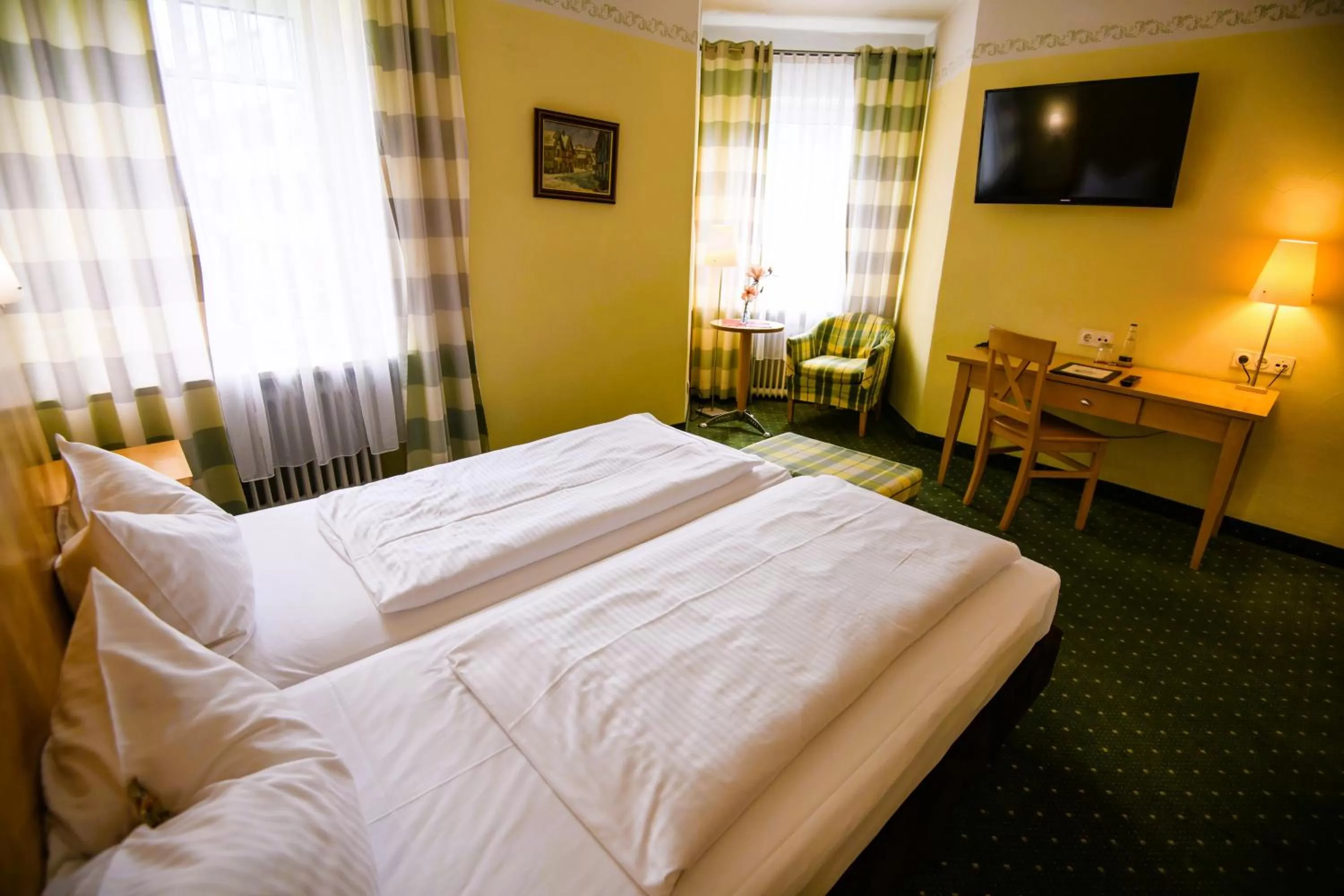 Bed in Hotel Rosenheimer Hof