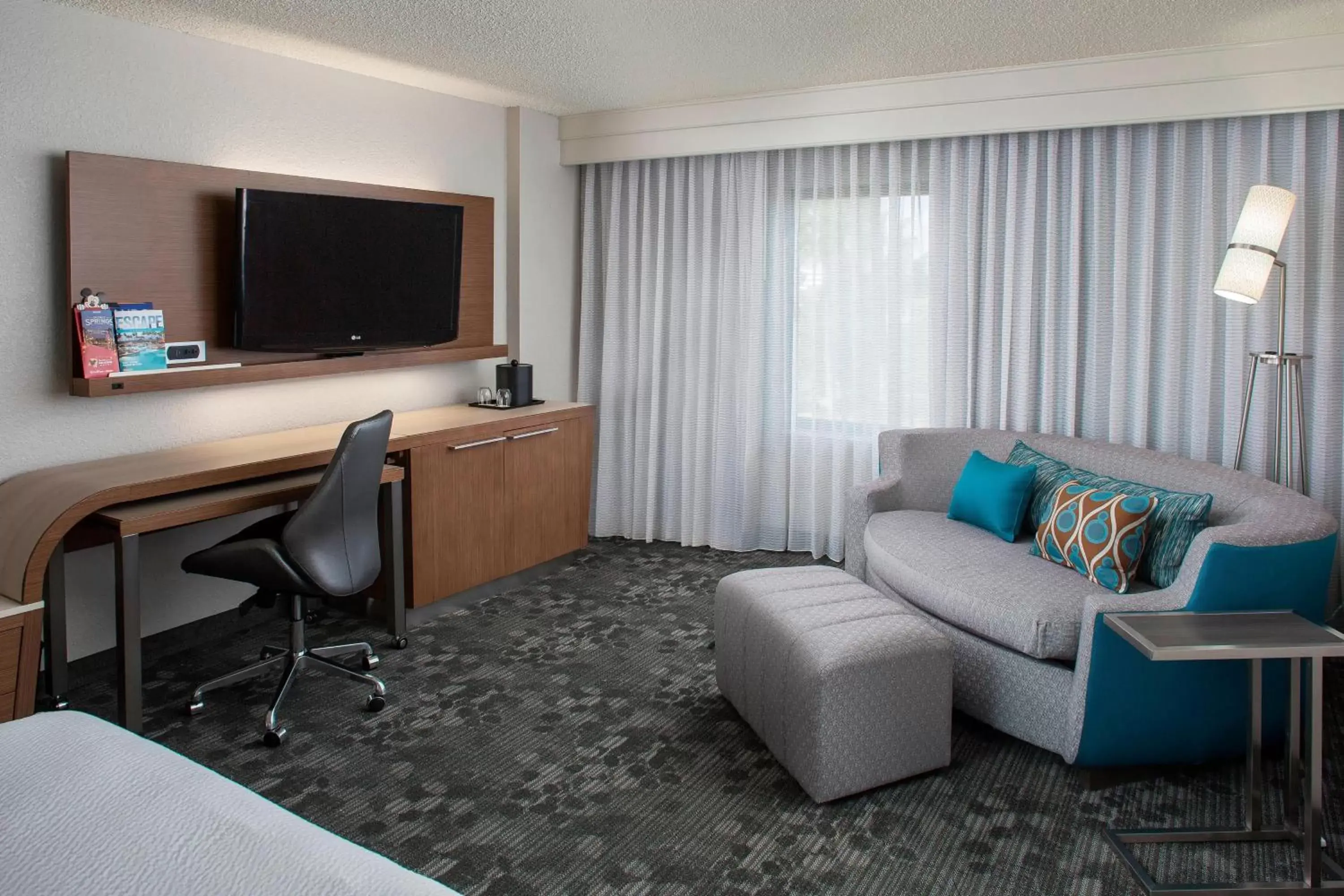 Photo of the whole room, TV/Entertainment Center in Courtyard by Marriott Orlando Lake Buena Vista in the Marriott Village