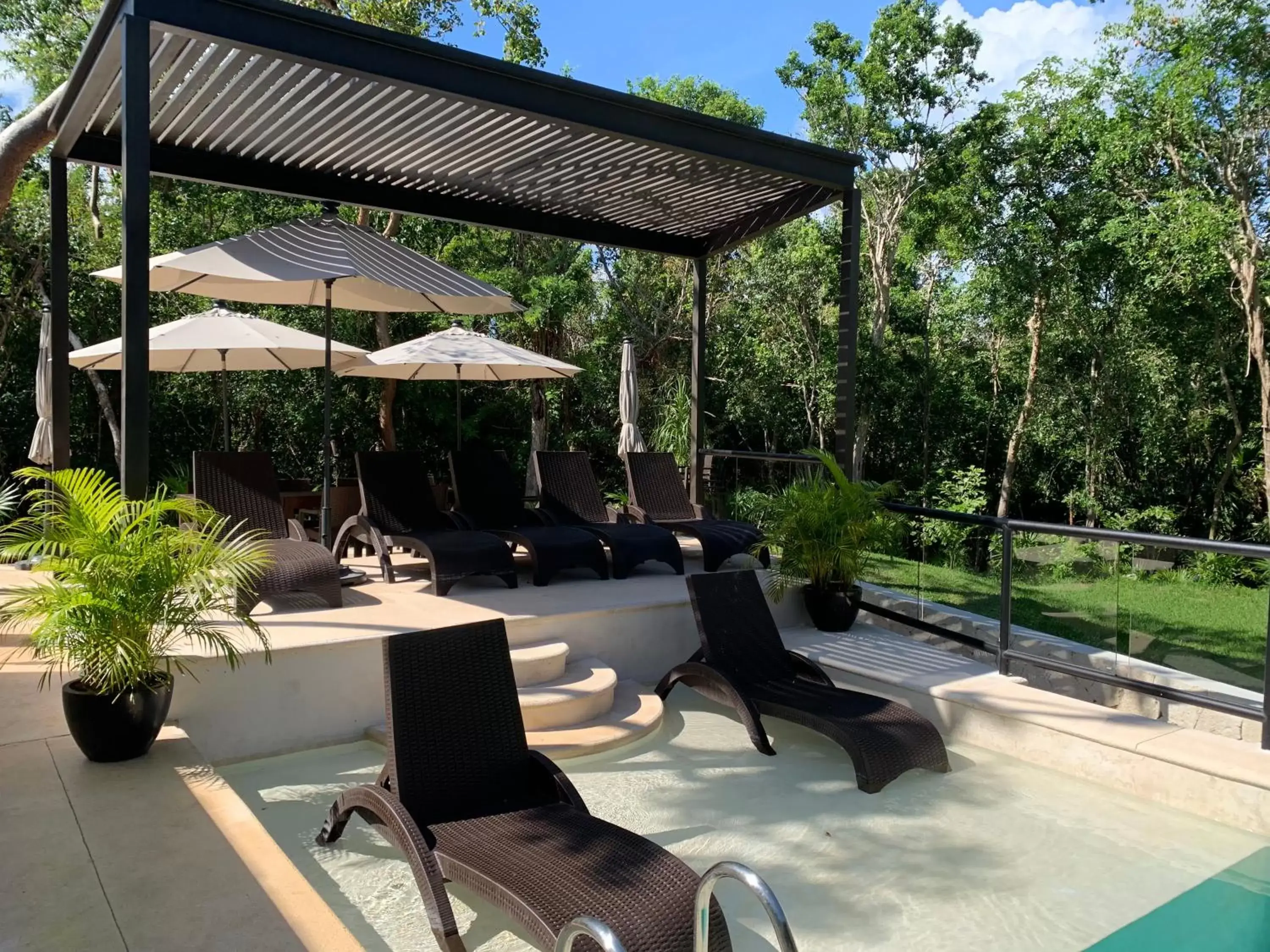 Patio, Swimming Pool in Xaha Villas Suites & Golf Resort