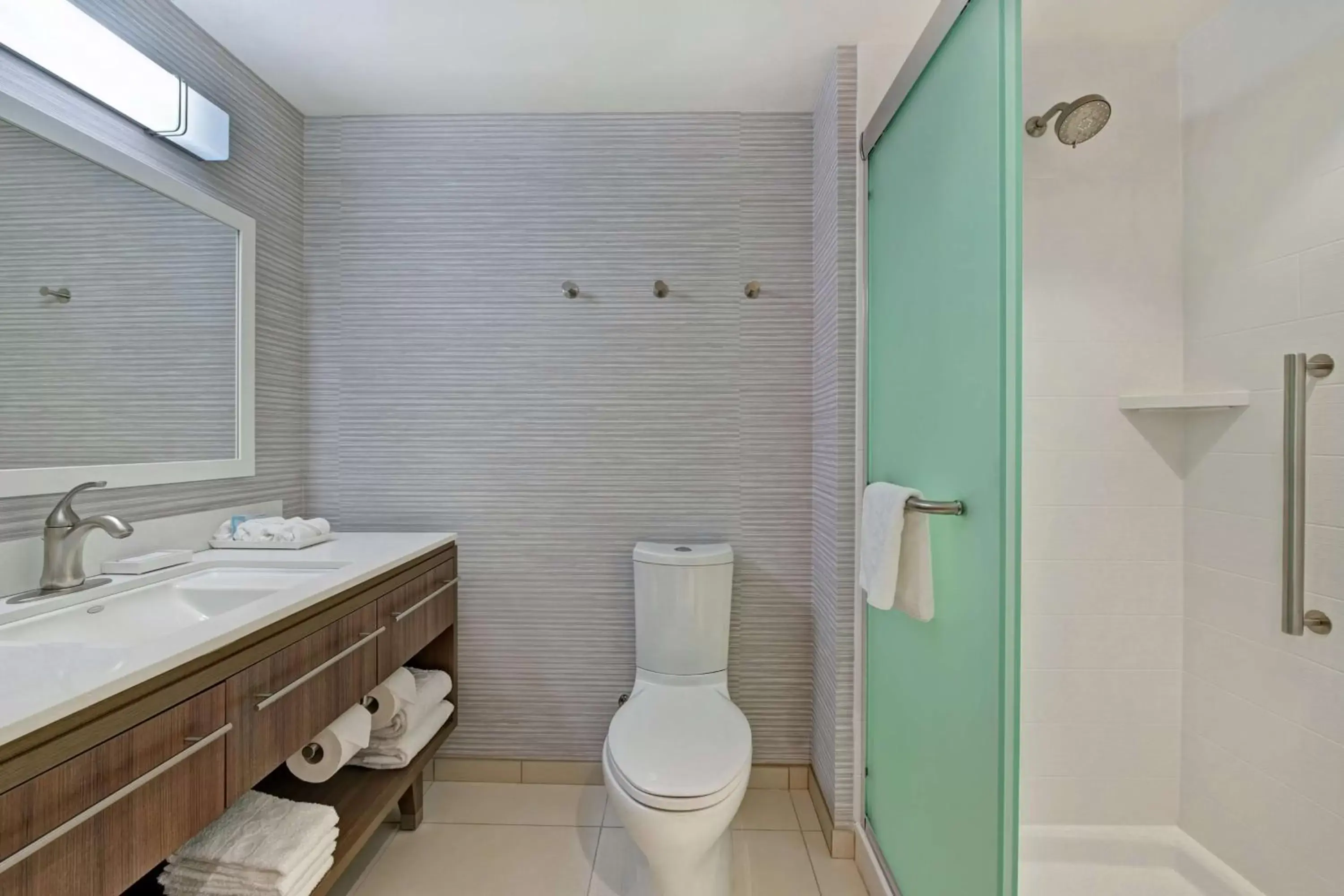 Bathroom in Home2 Suites By Hilton West Palm Beach Airport