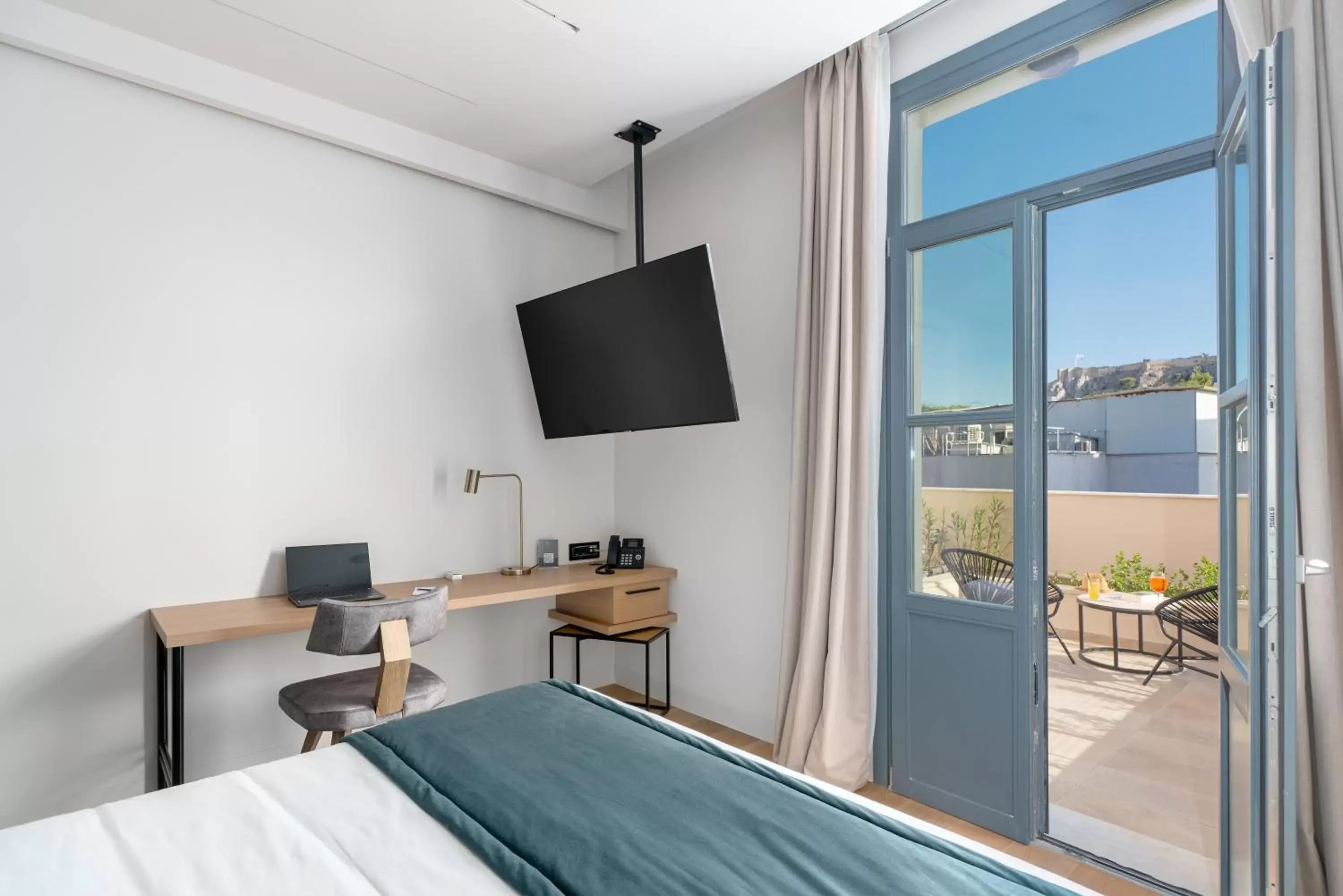 TV and multimedia in Hellenic Vibes Smart Hotel