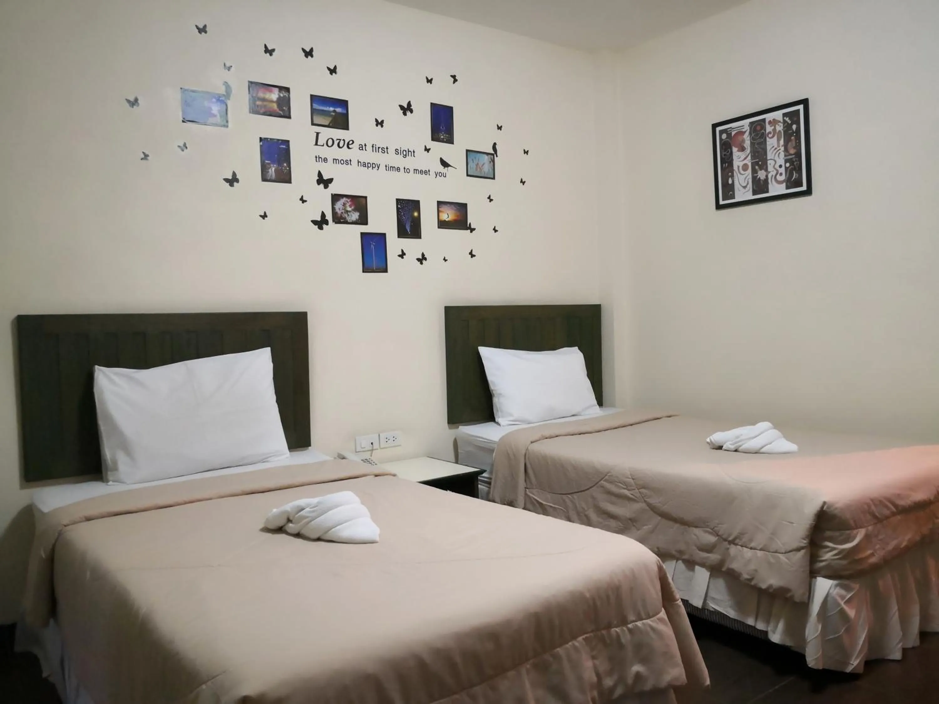 Bed in Baan Suksiri Hotel