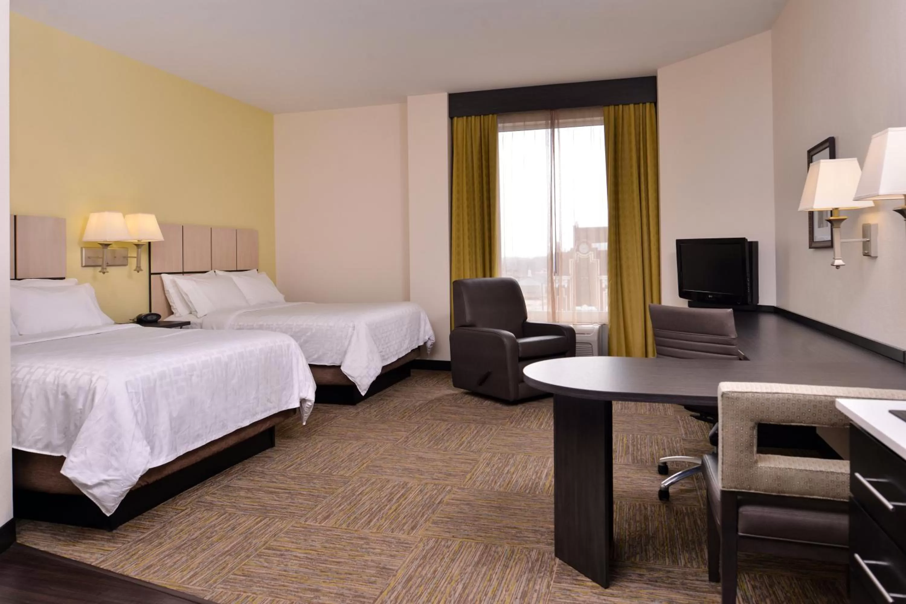 Photo of the whole room, Bed in Candlewood Suites Terre Haute by IHG