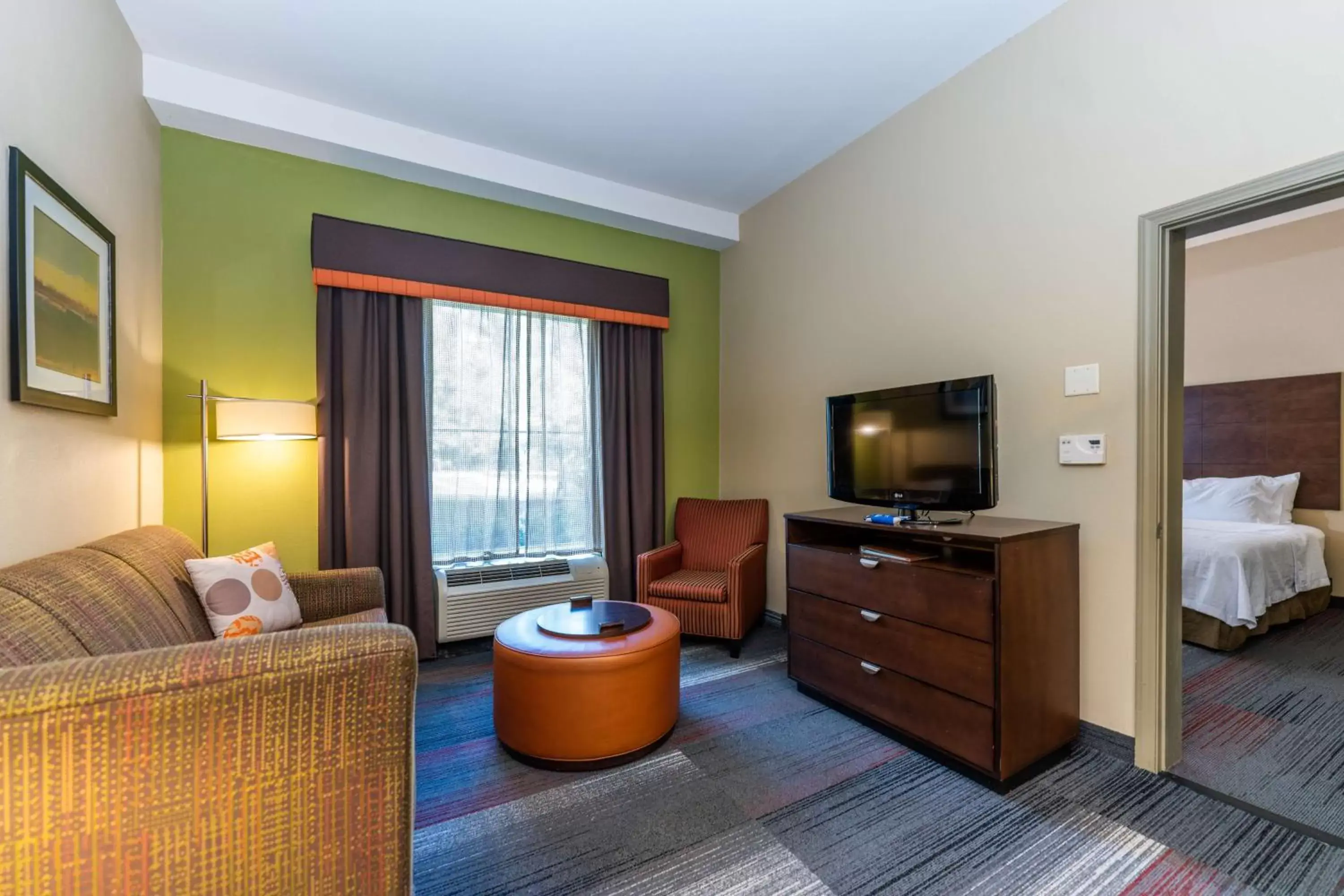 Living room, TV/Entertainment Center in Homewood Suites by Hilton Birmingham-SW-Riverchase-Galleria