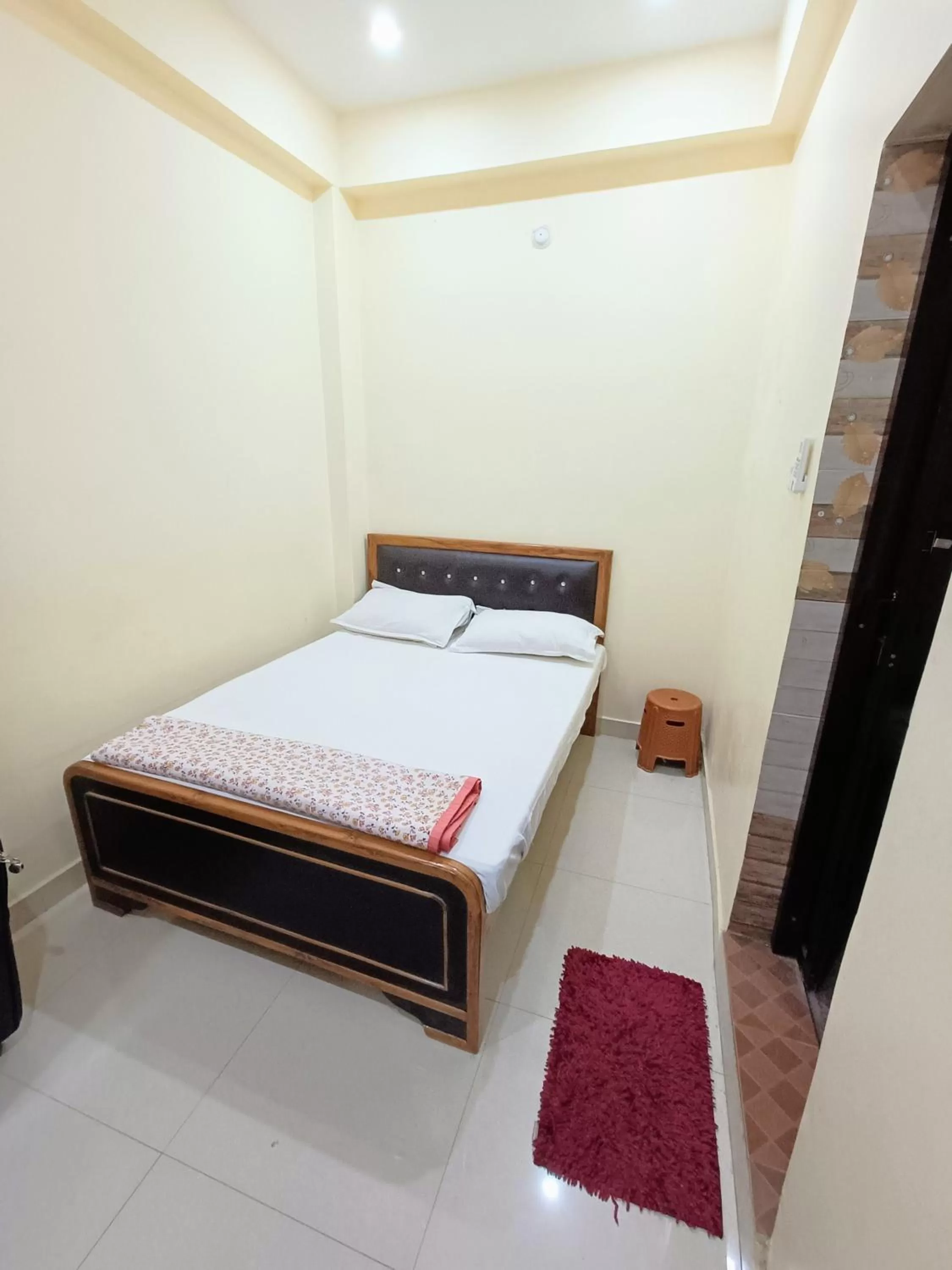 Bed in Hotel Saraswati Palace