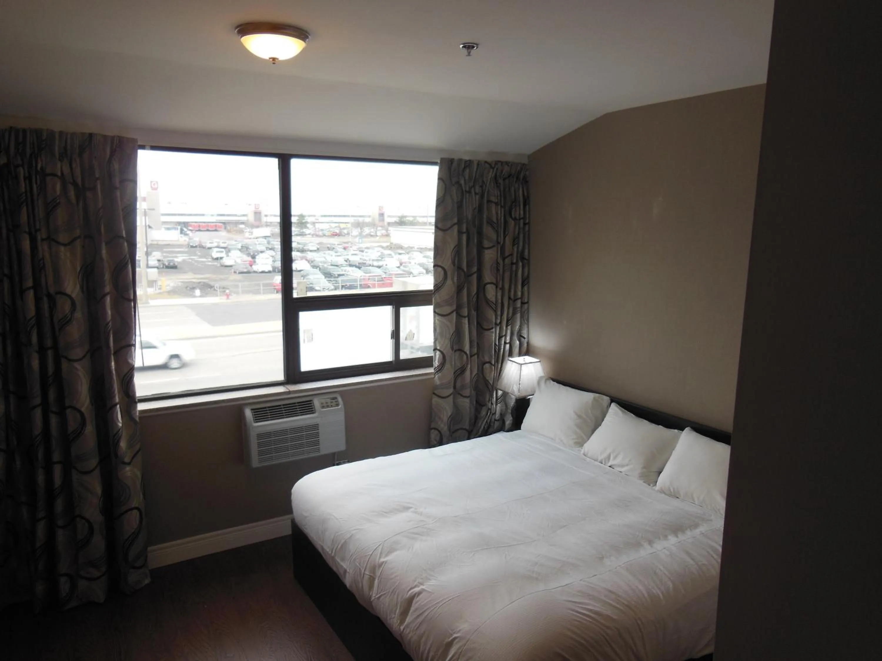 Bed in NU Hotel Toronto Airport