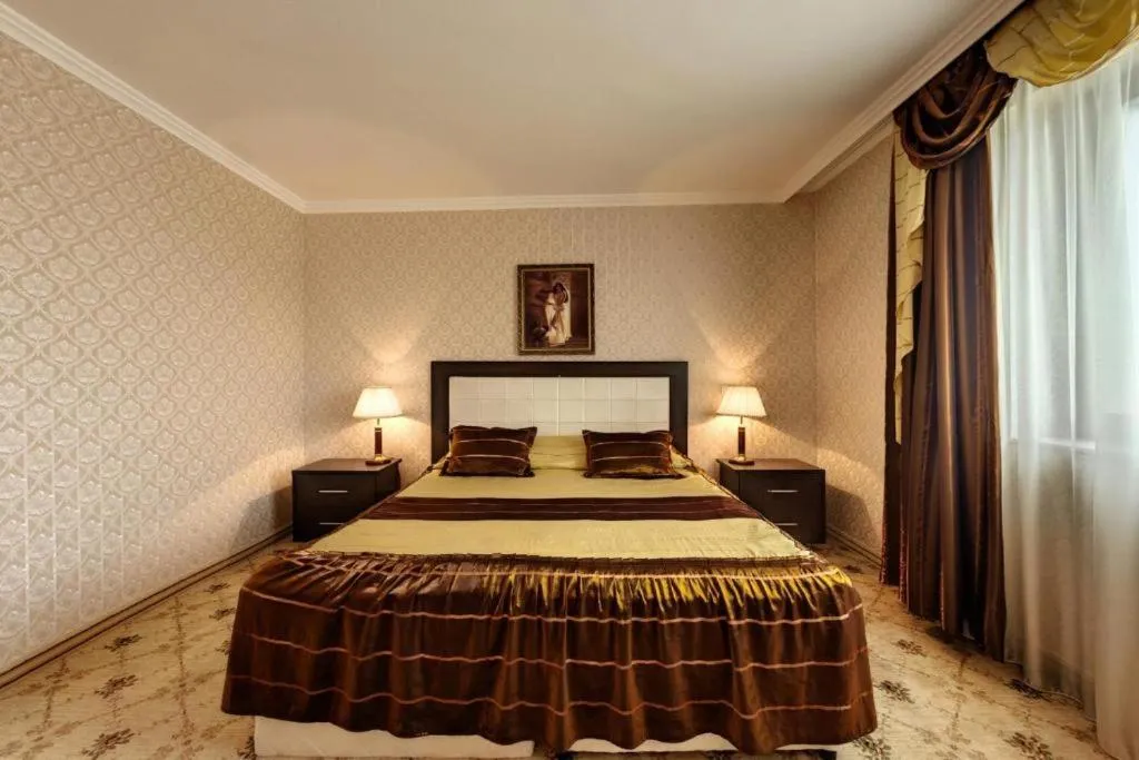 Bed in Merian Palace Hotel