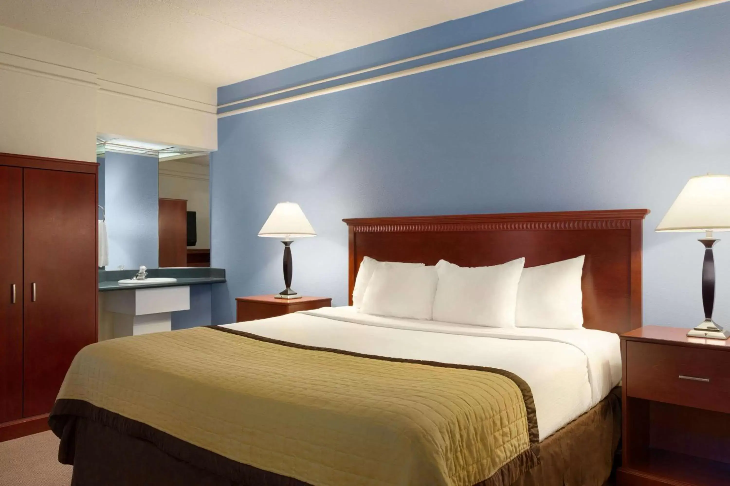 Photo of the whole room, Bed in Ramada by Wyndham Fargo