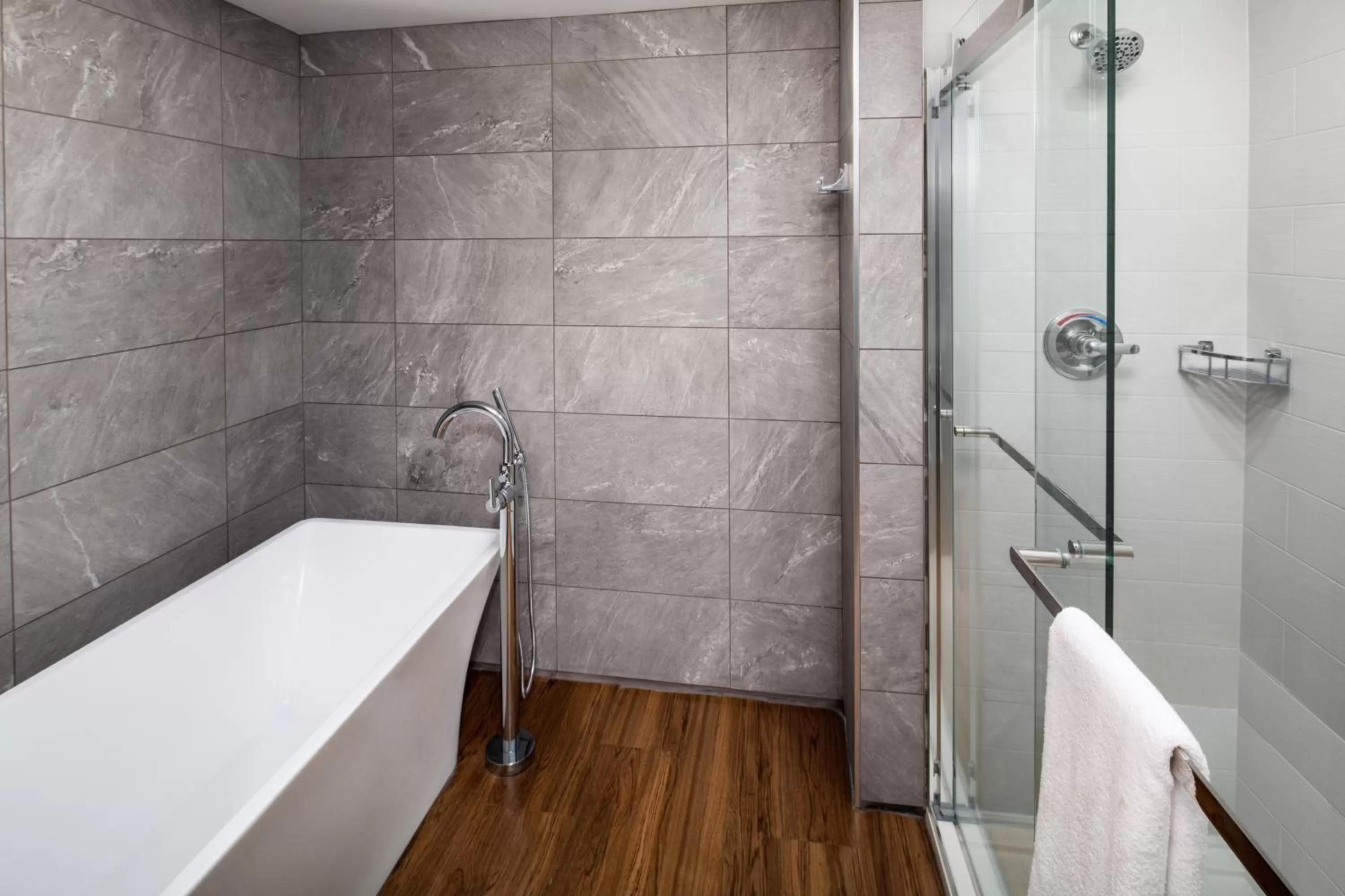 Bathroom in voco Saranac Lake NY - Waterfront by IHG