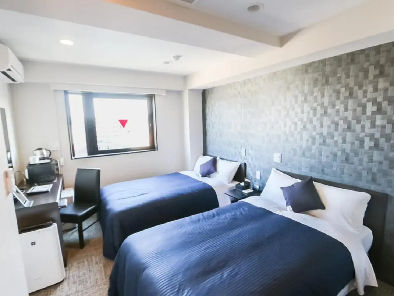 Bed in HOTEL LiVEMAX Hachioji Ekimae