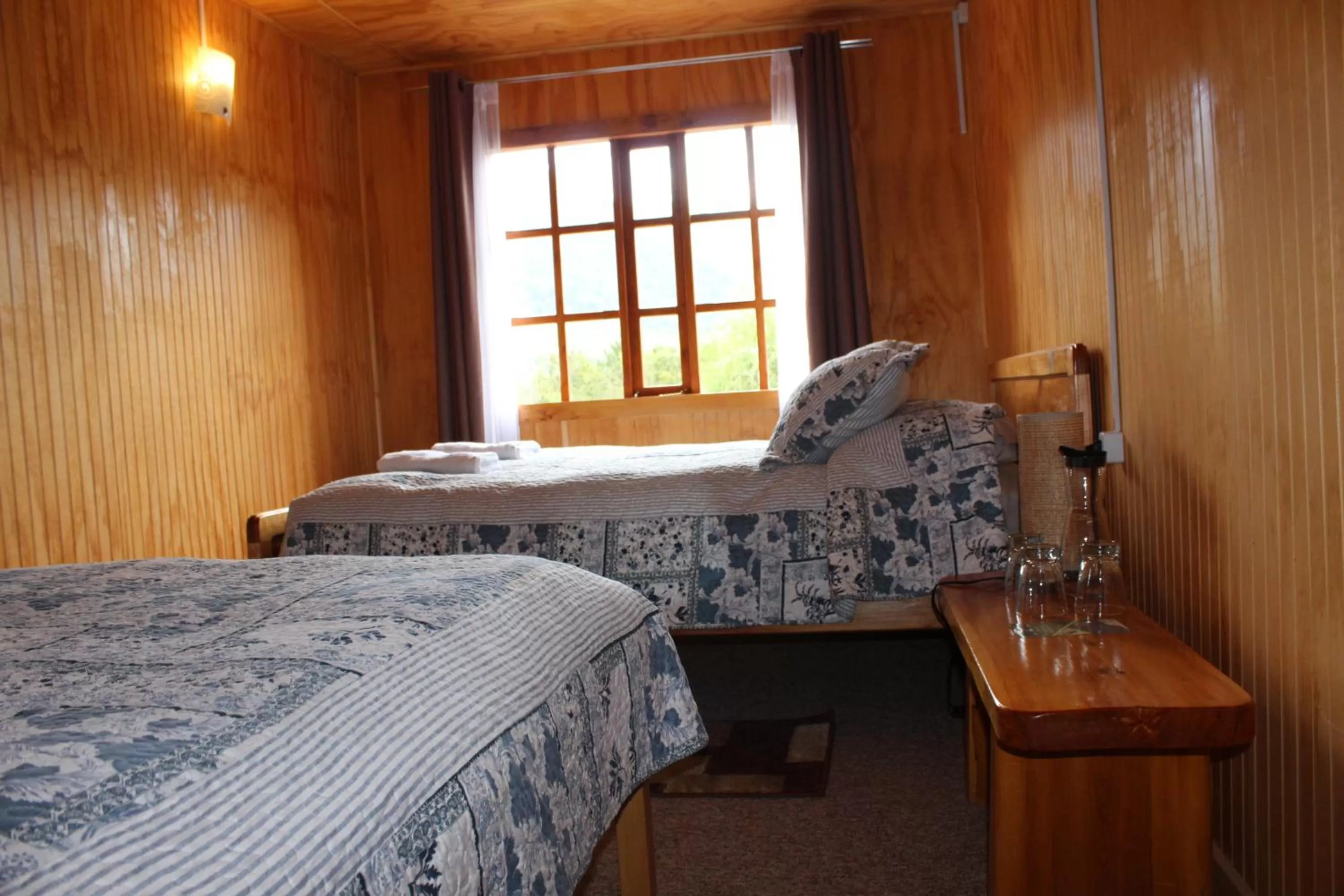 Photo of the whole room, Bed in Los Mañíos Del Queulat Puyuhuapi