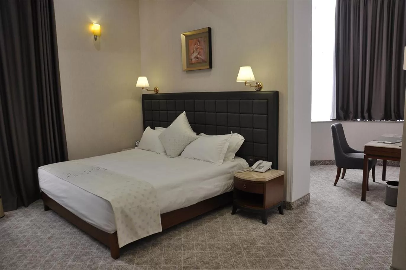 Bed in Parliament Palace Hotel