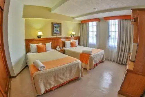 Photo of the whole room, Bed in Hotel Báez Carrizal