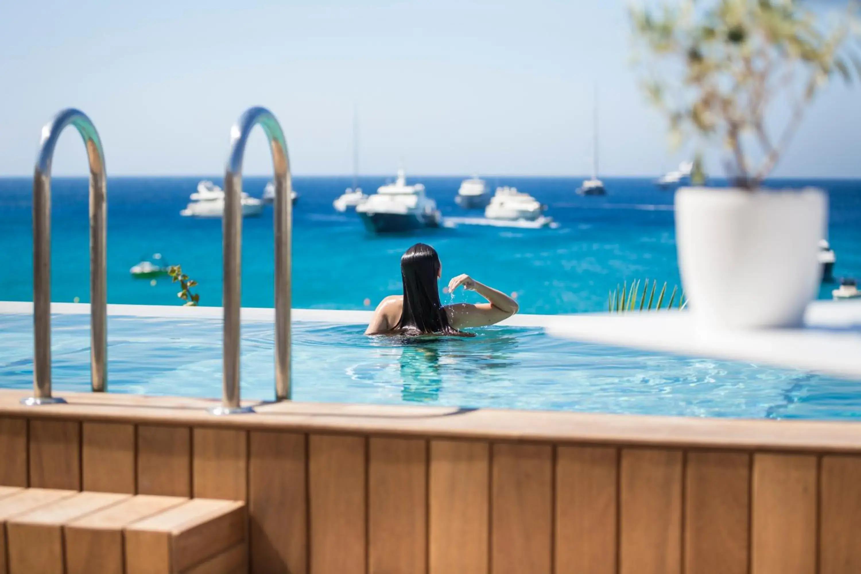 Seating area, Swimming Pool in Mykonos Dove Beachfront Hotel