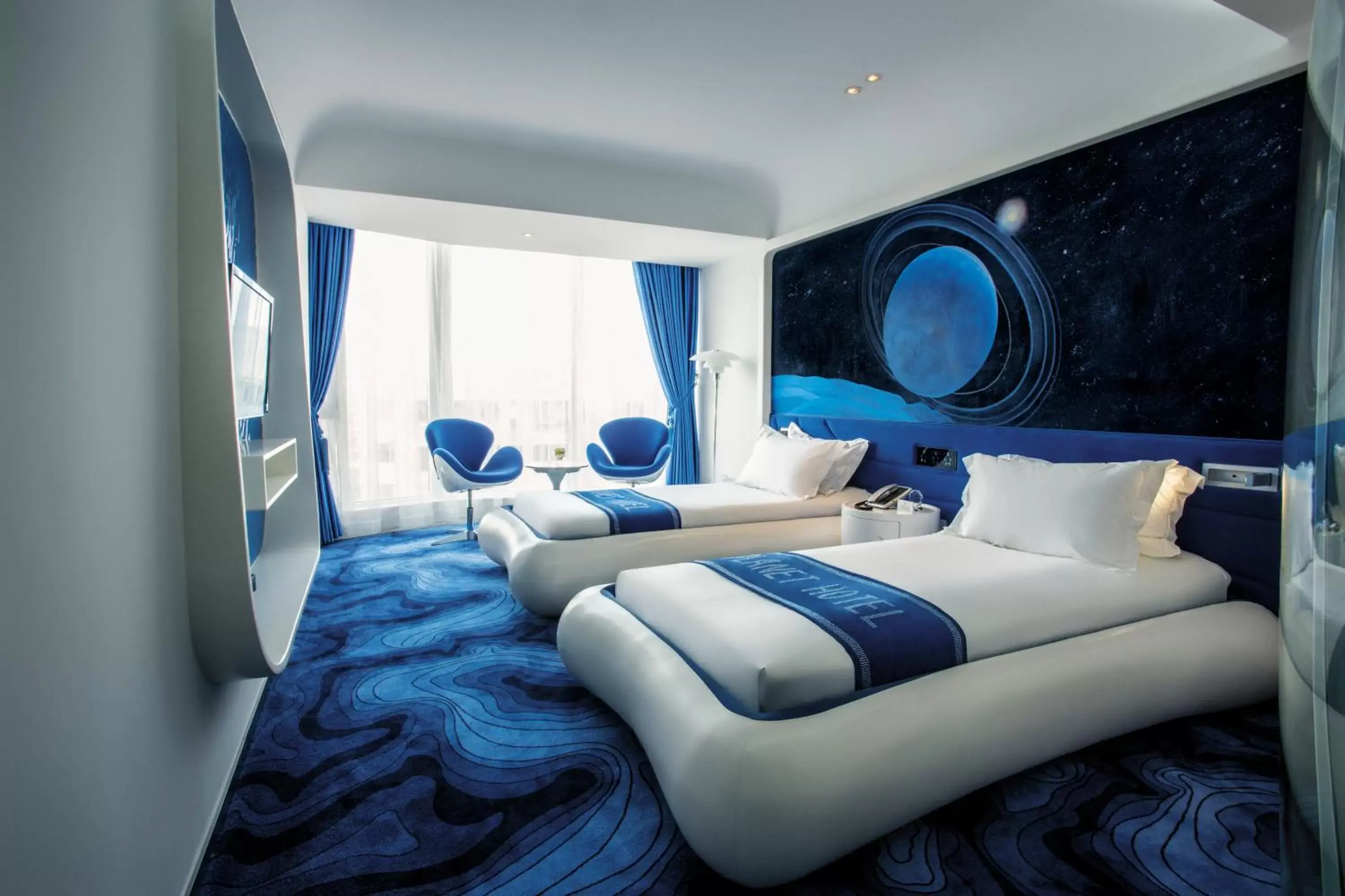 Photo of the whole room, Bed in Guangzhou Planet Hotel