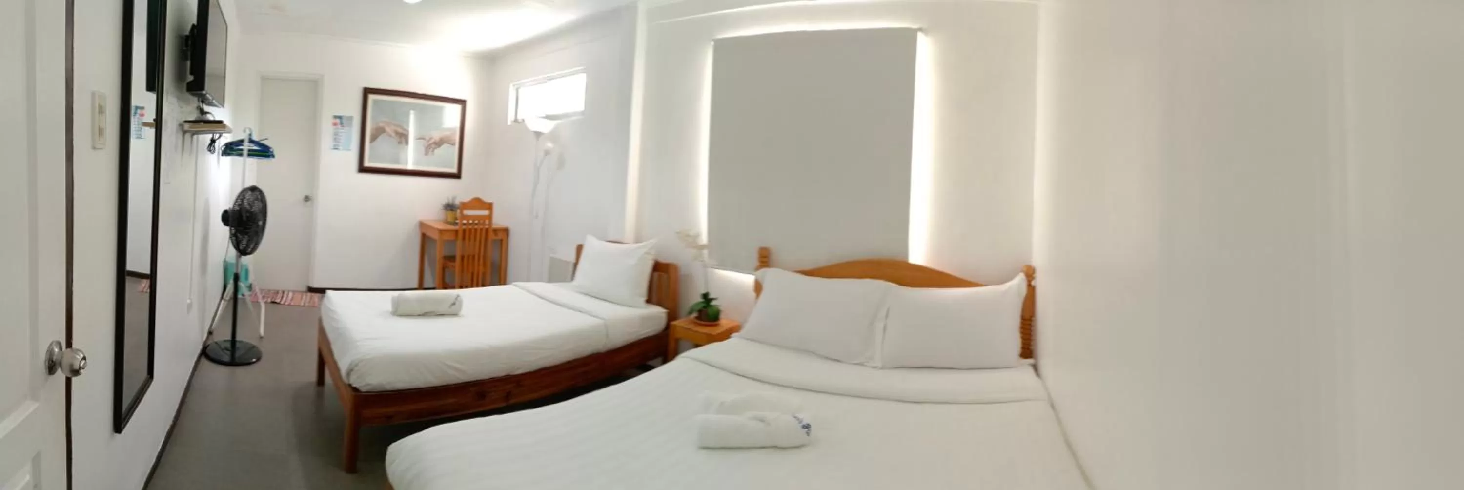 Photo of the whole room, Bed in Amor's Place