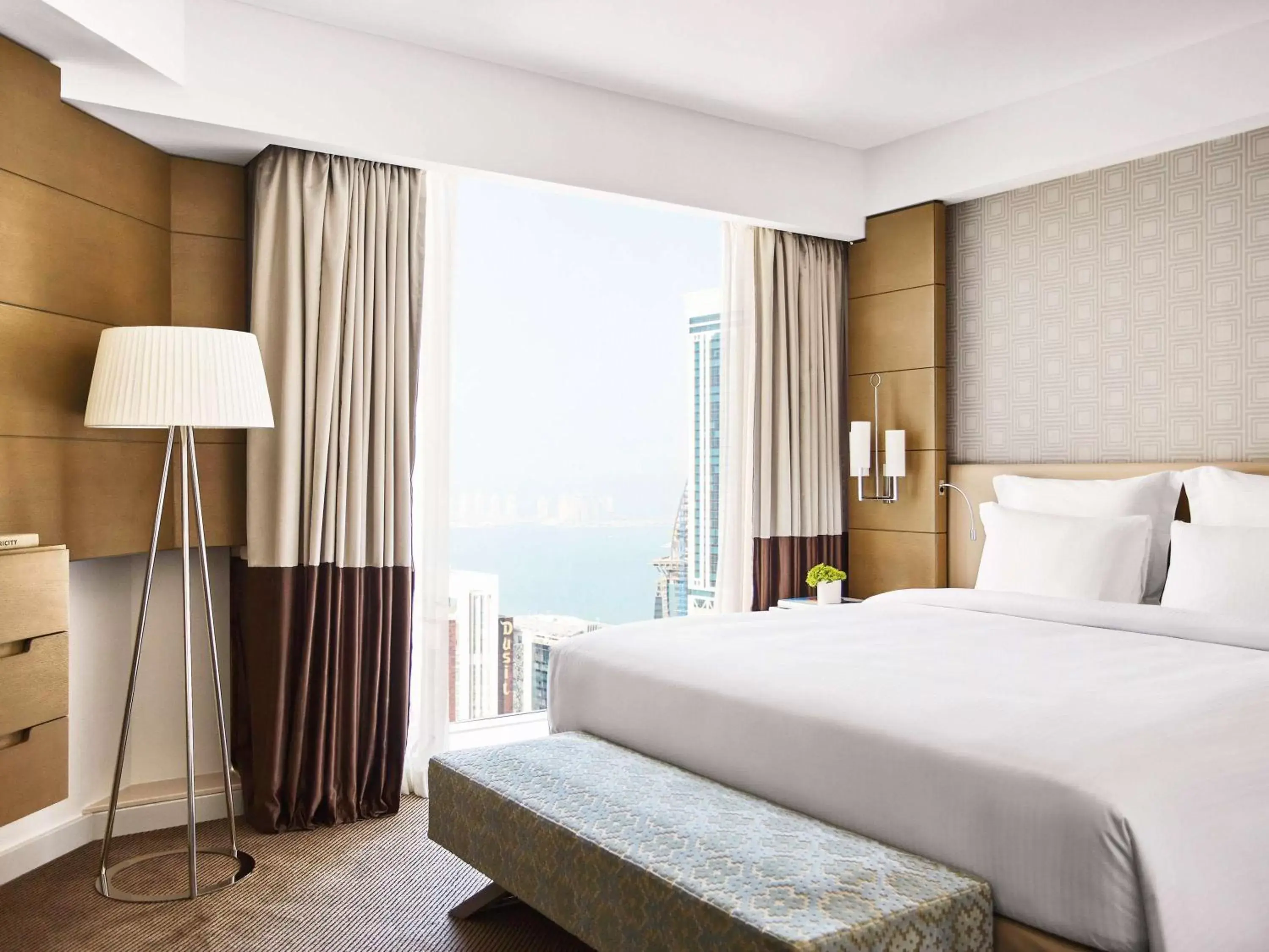 Photo of the whole room, Bed in Pullman Doha West Bay