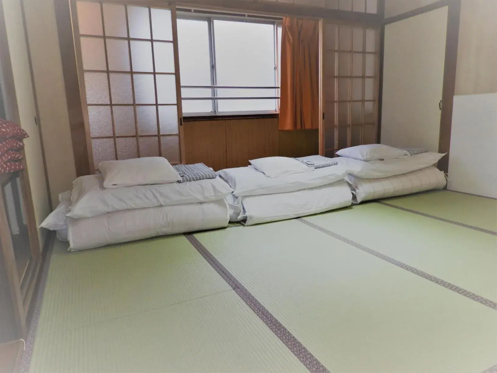 Photo of the whole room, Bed in Yamamoto Ryokan