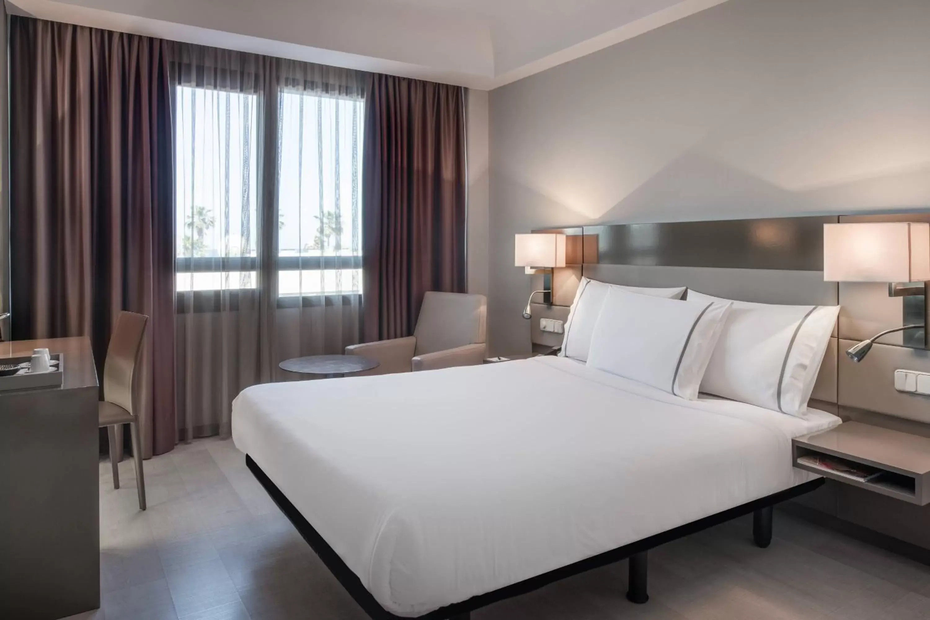 Photo of the whole room, Bed in AC Hotel Iberia Las Palmas by Marriott