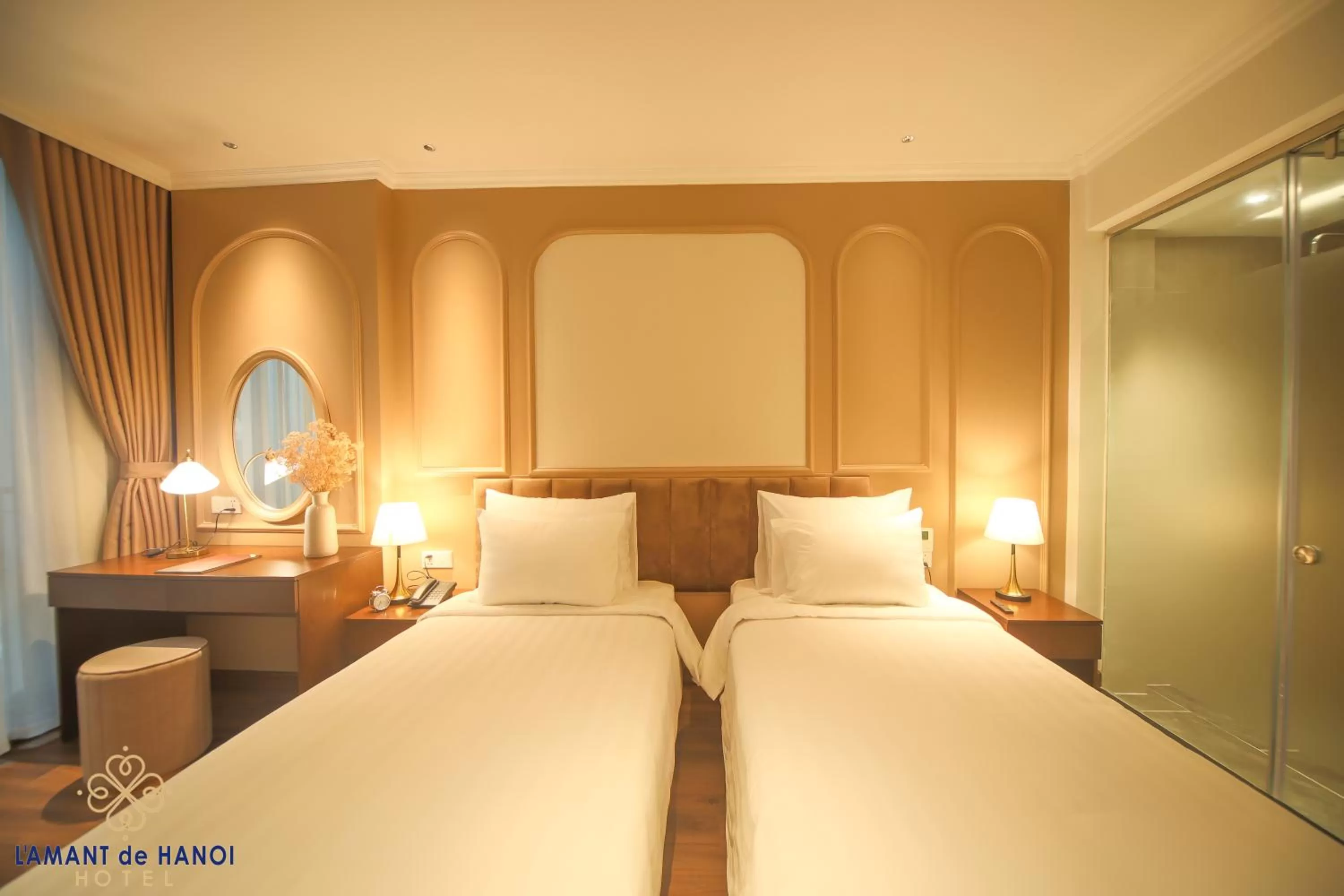 Bed in L'amant de Hanoi Hotel - khách sạn Lamant de Hà Nội