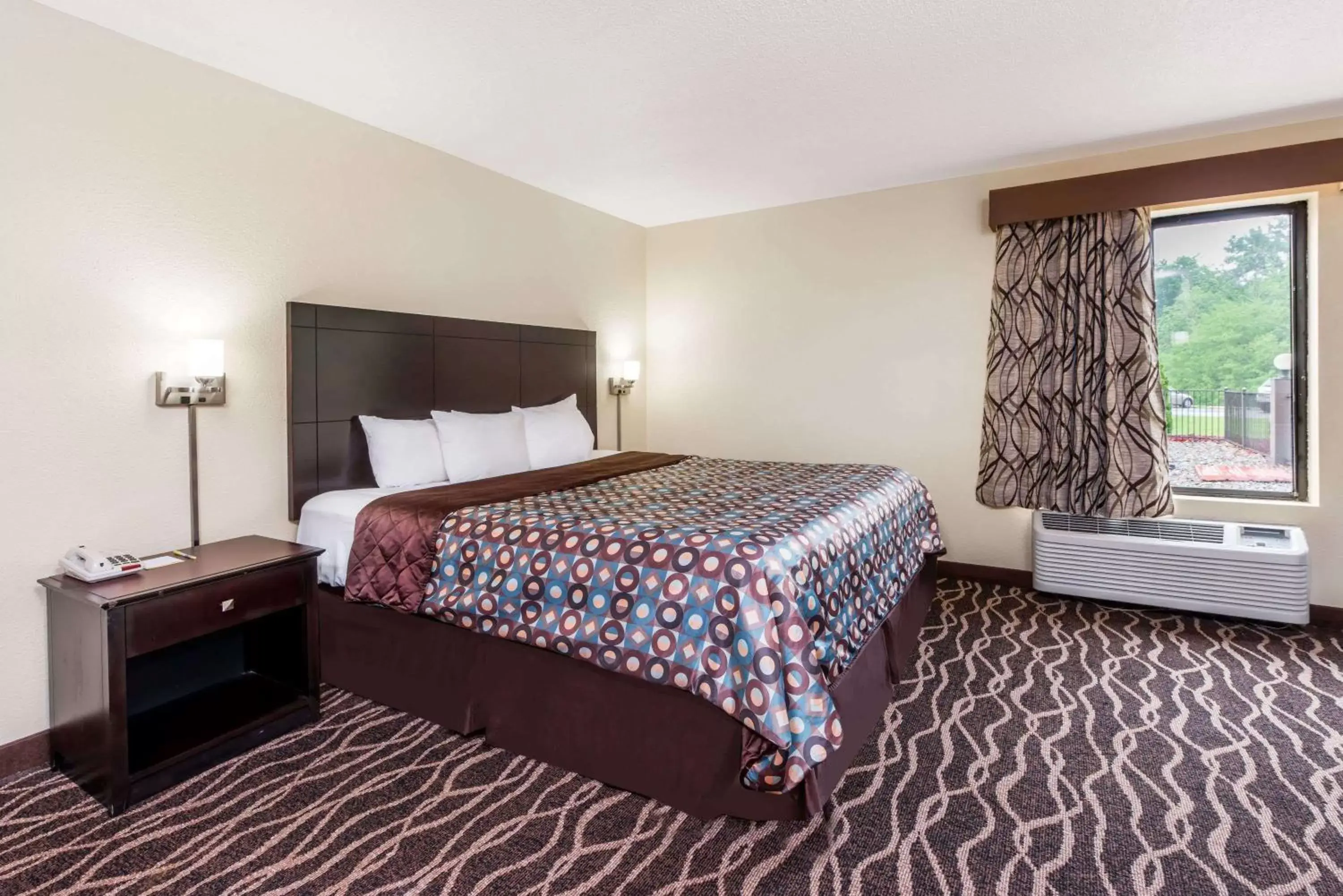 Photo of the whole room, Bed in Days Inn & Suites by Wyndham Casey