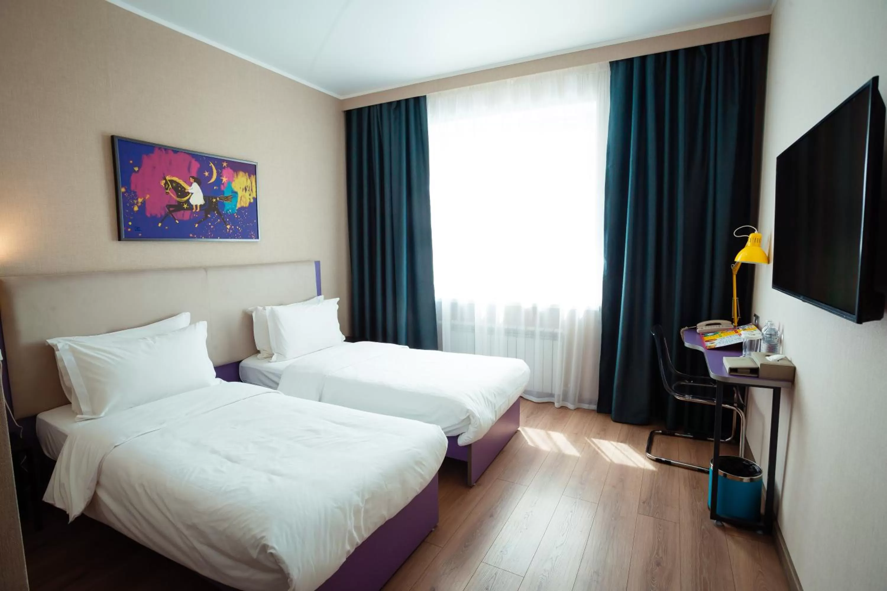 Bed in City Hotel Shymkent