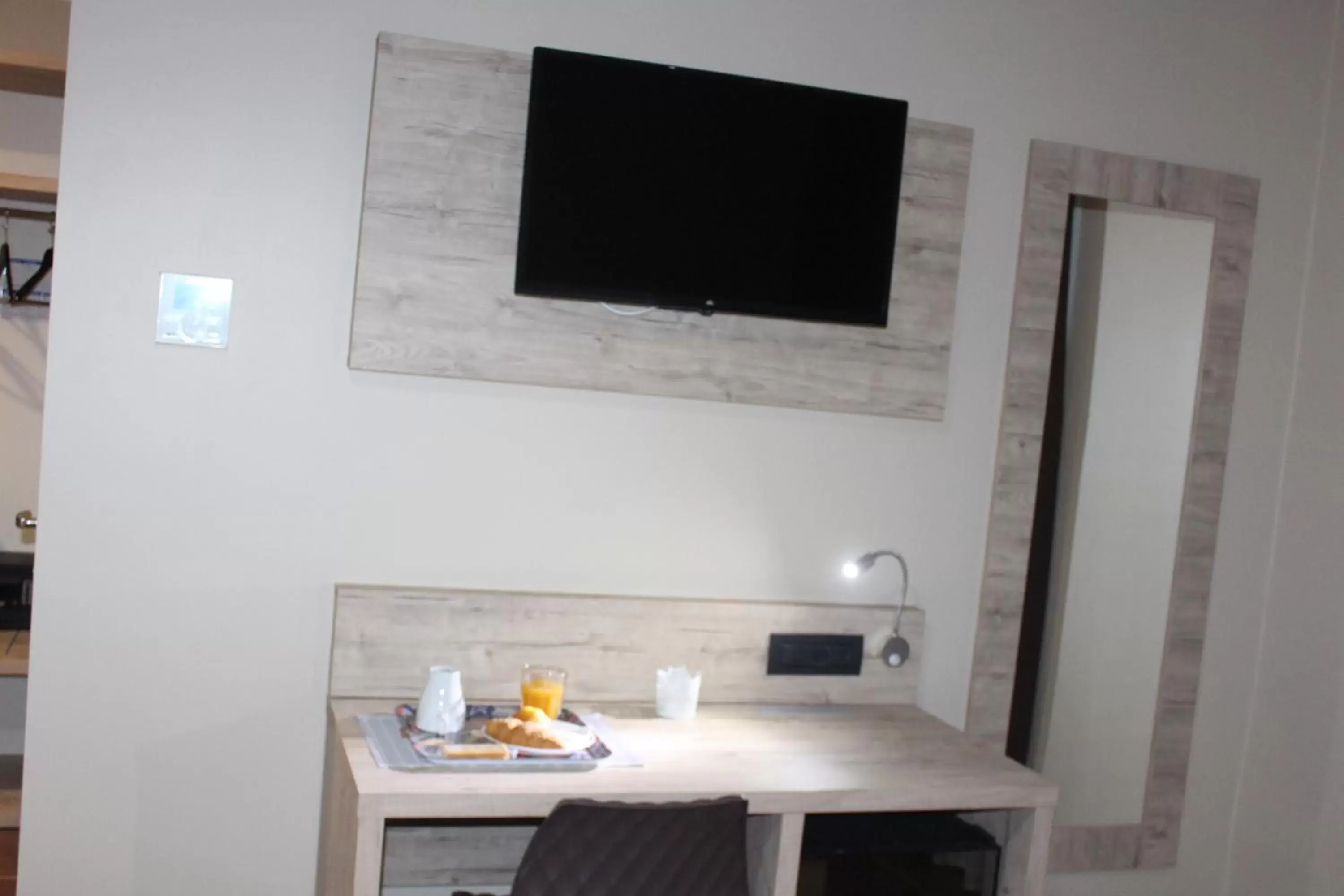 TV and multimedia, TV/Entertainment Center in Hotel Giacosa