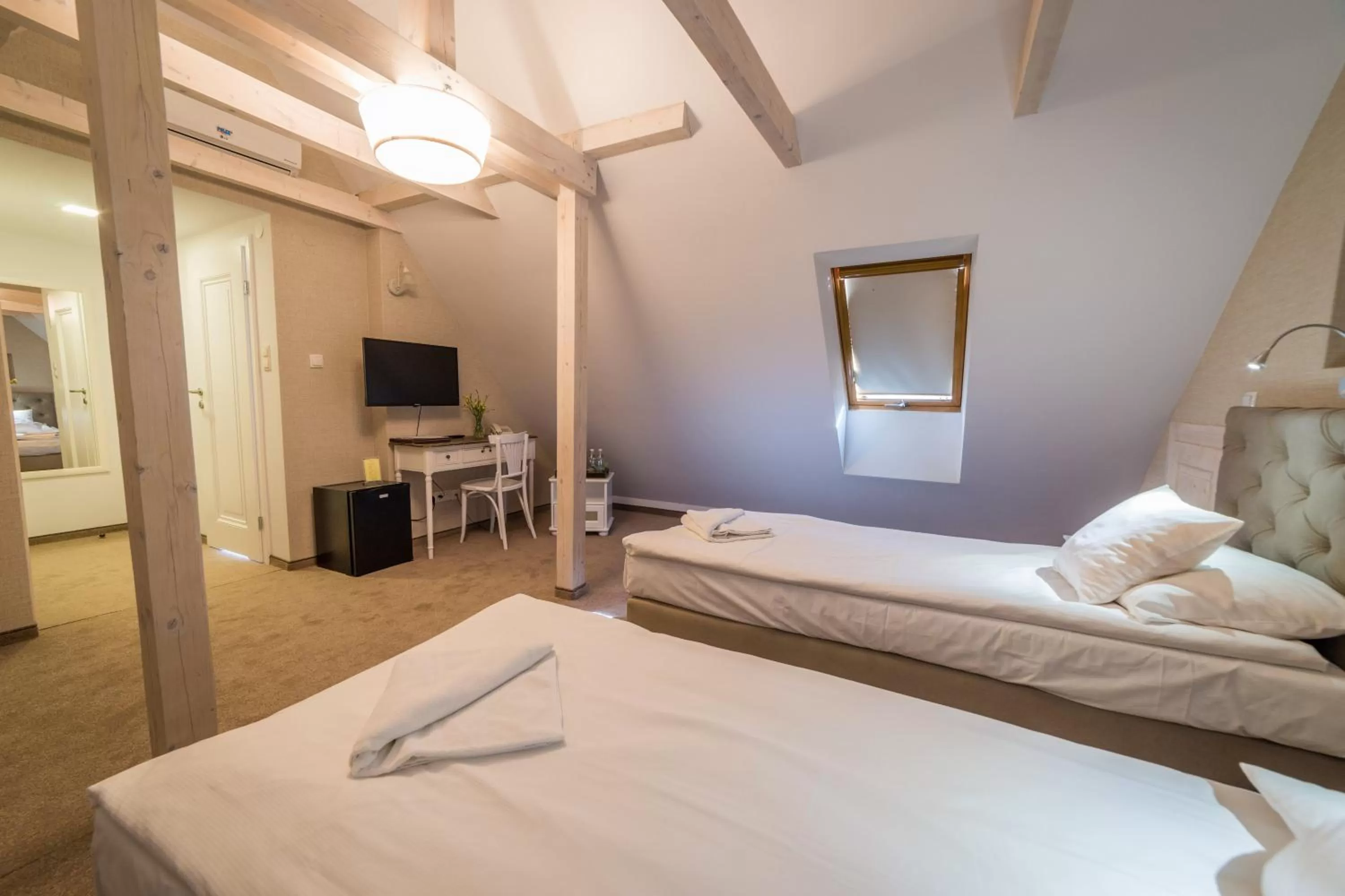 Photo of the whole room, Bed in Amax Boutique Hotel