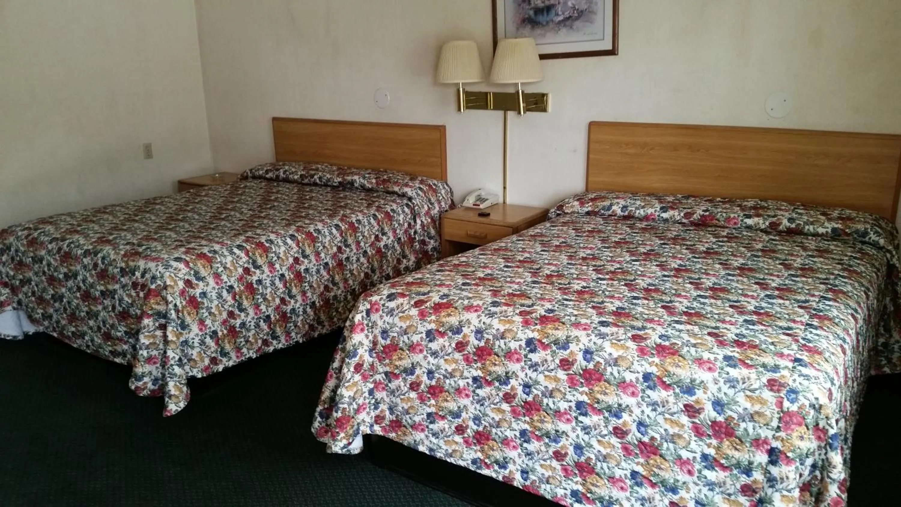 Bed in Economy Inn Motel