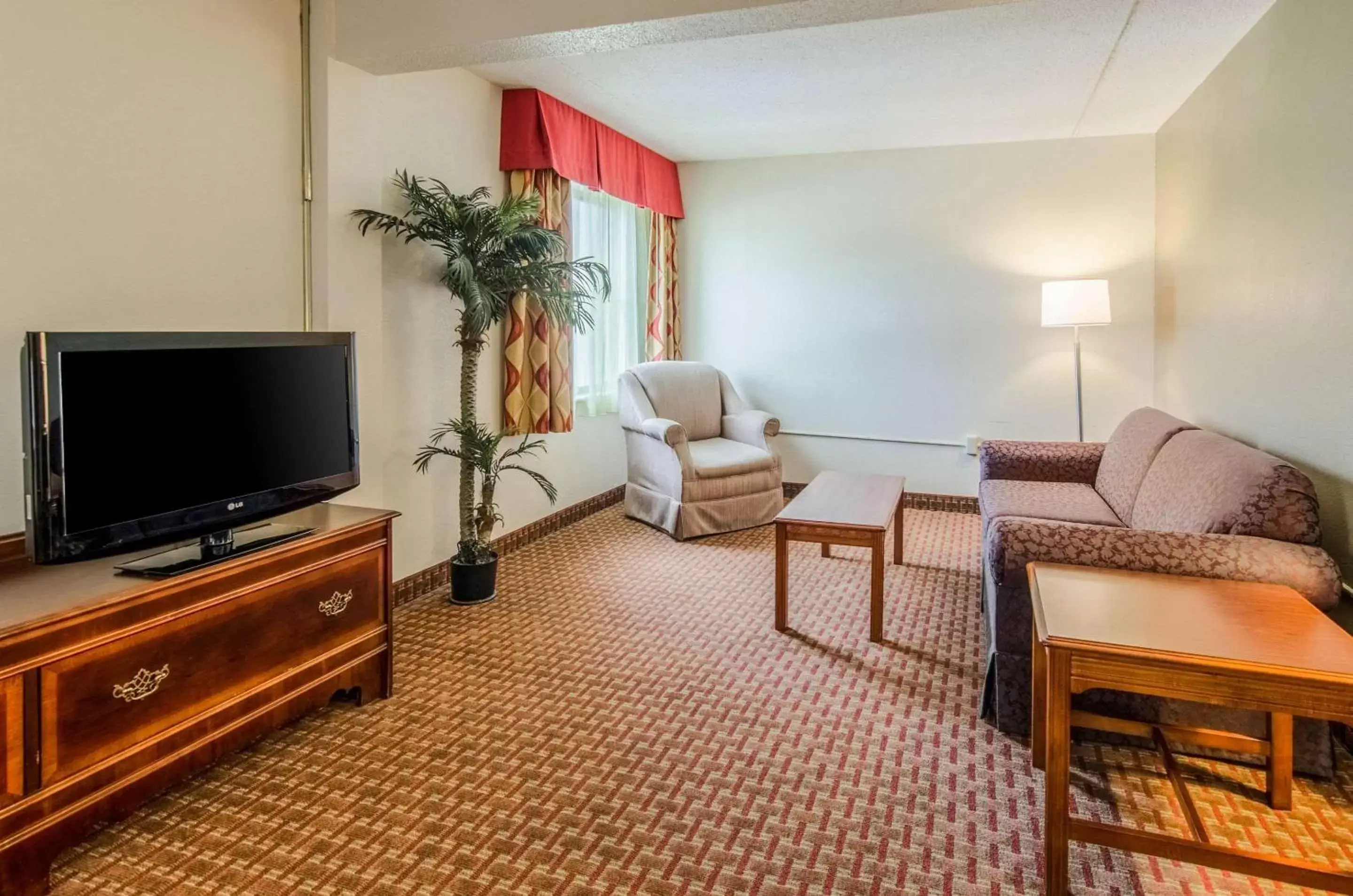 Photo of the whole room, TV/Entertainment Center in Quality Inn & Suites Lexington near I-64 and I-81