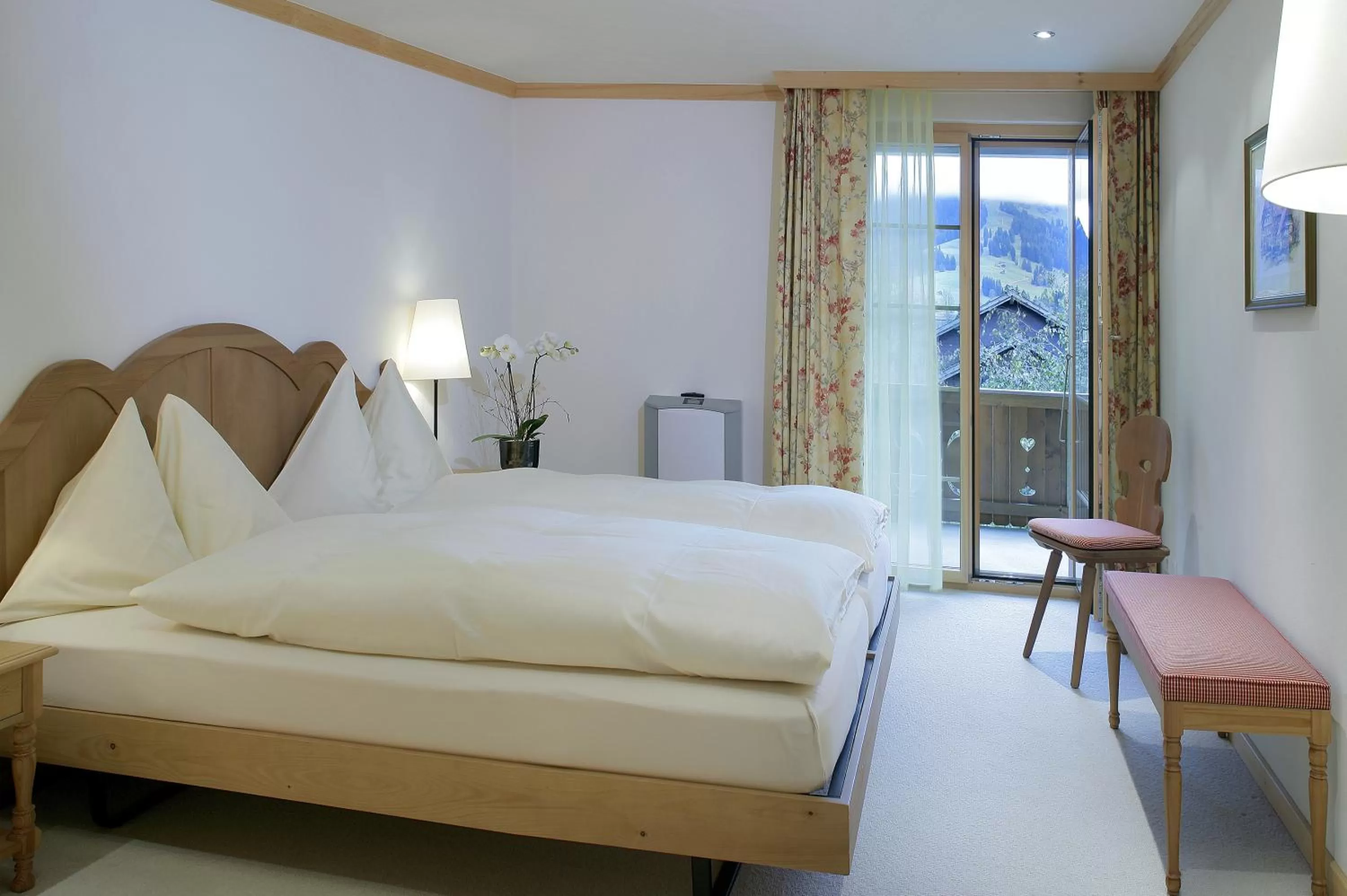 Photo of the whole room, Bed in Hotel Bellerive Gstaad