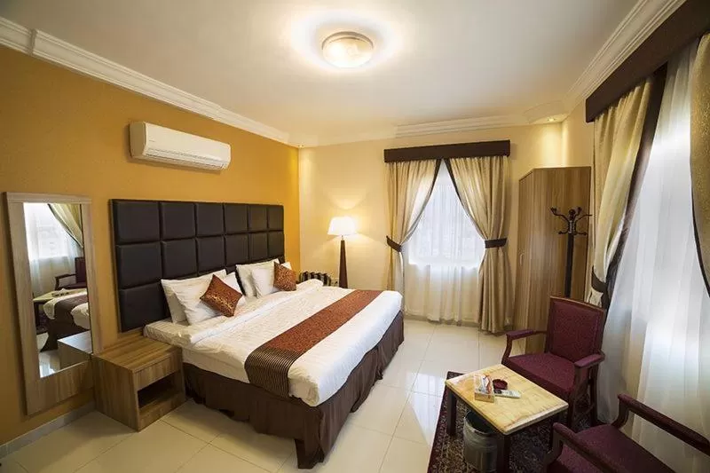 Bed in DIWAN ALASEEL ALRAQI