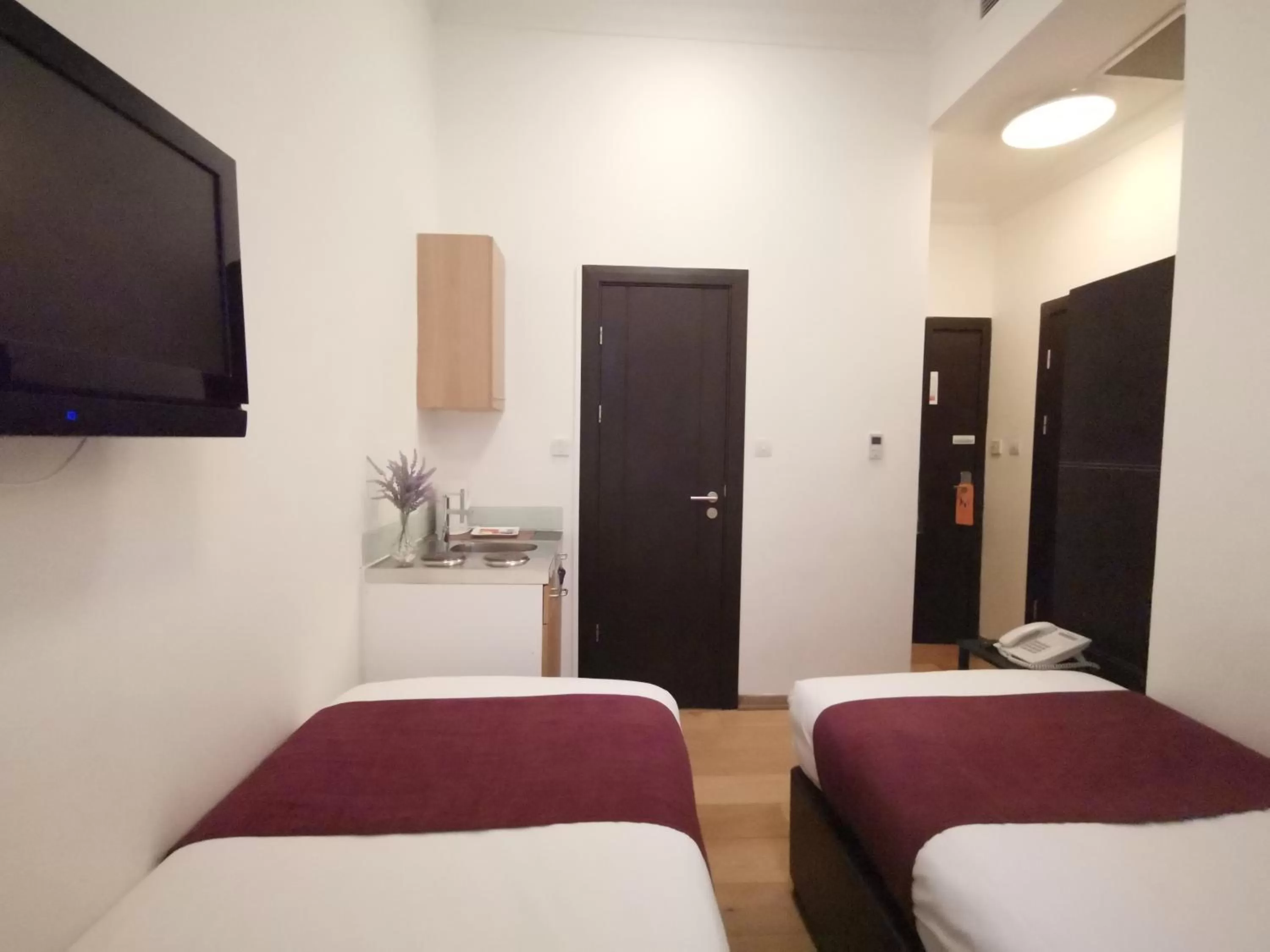 Bed in The Royale Chulan Hyde Park Hotel