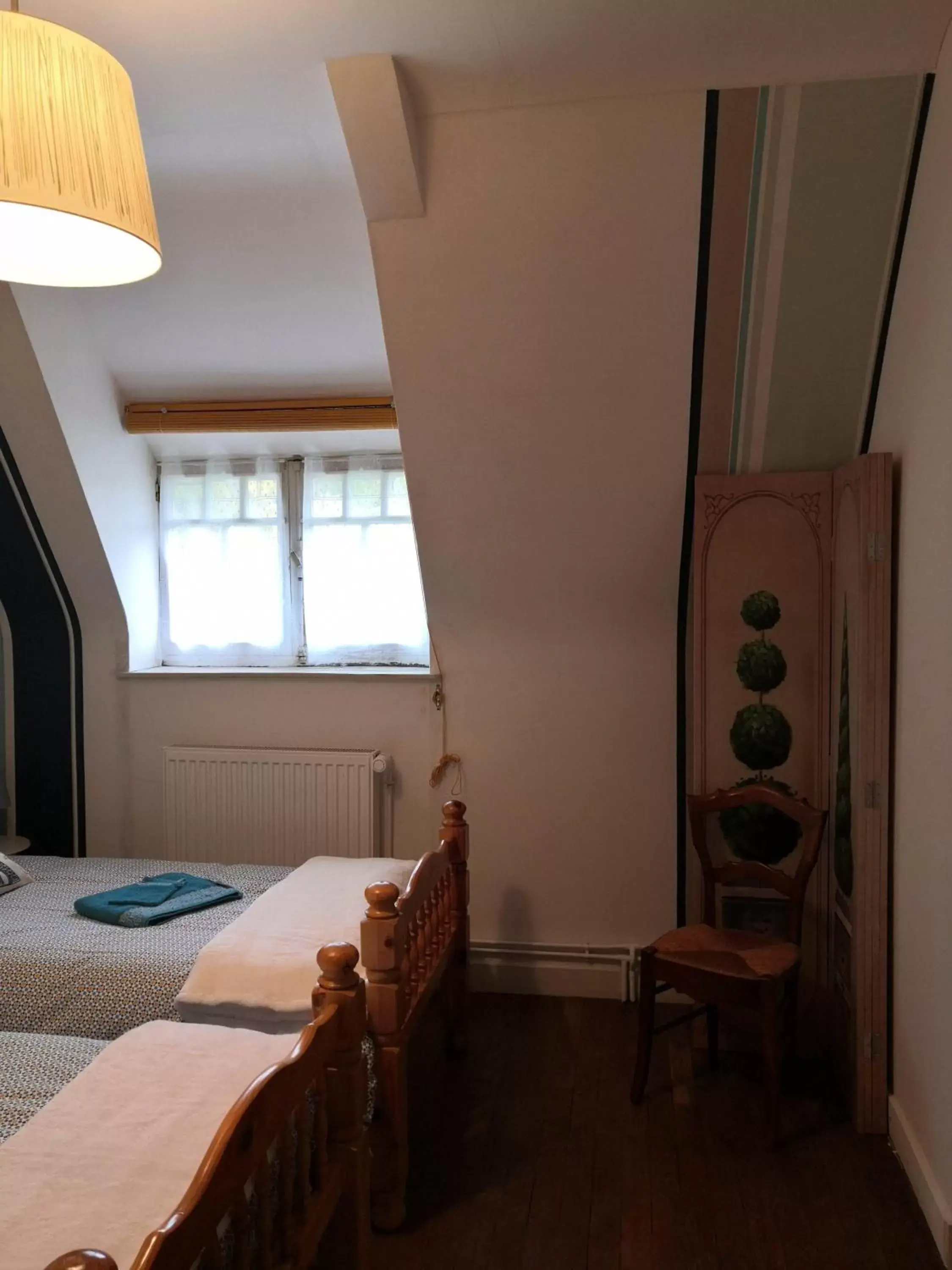 Bedroom in Le Manoir du Gouverneur