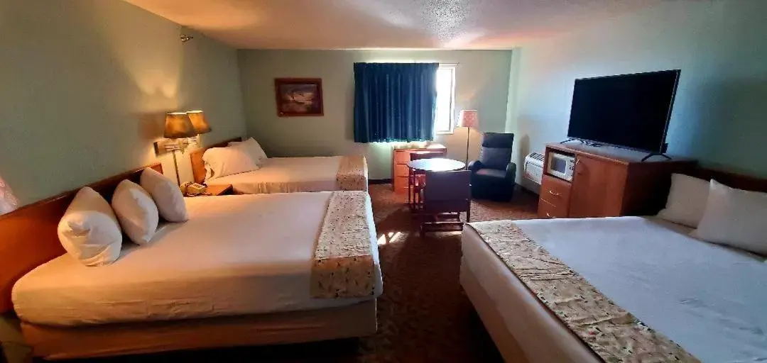 Bed in Gettysburg Inn and Suites