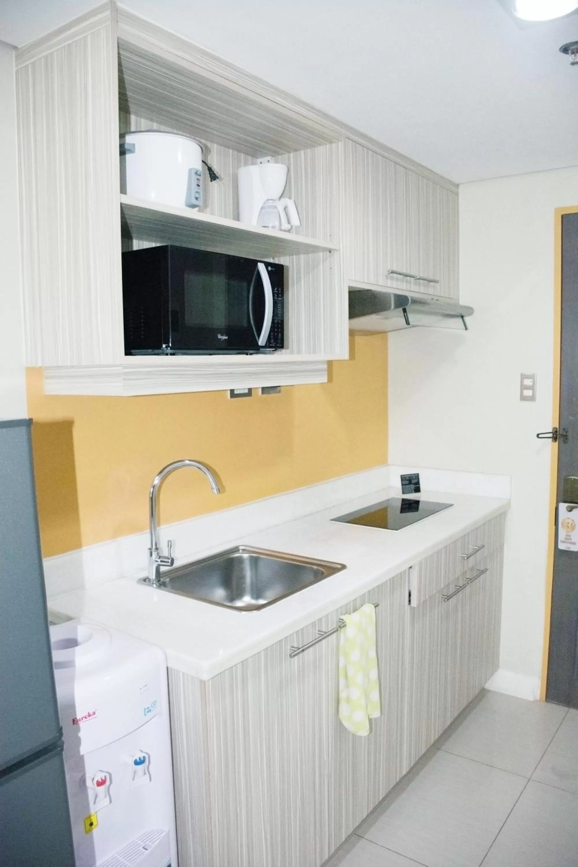 Kitchen or kitchenette in Alicia Apartelle