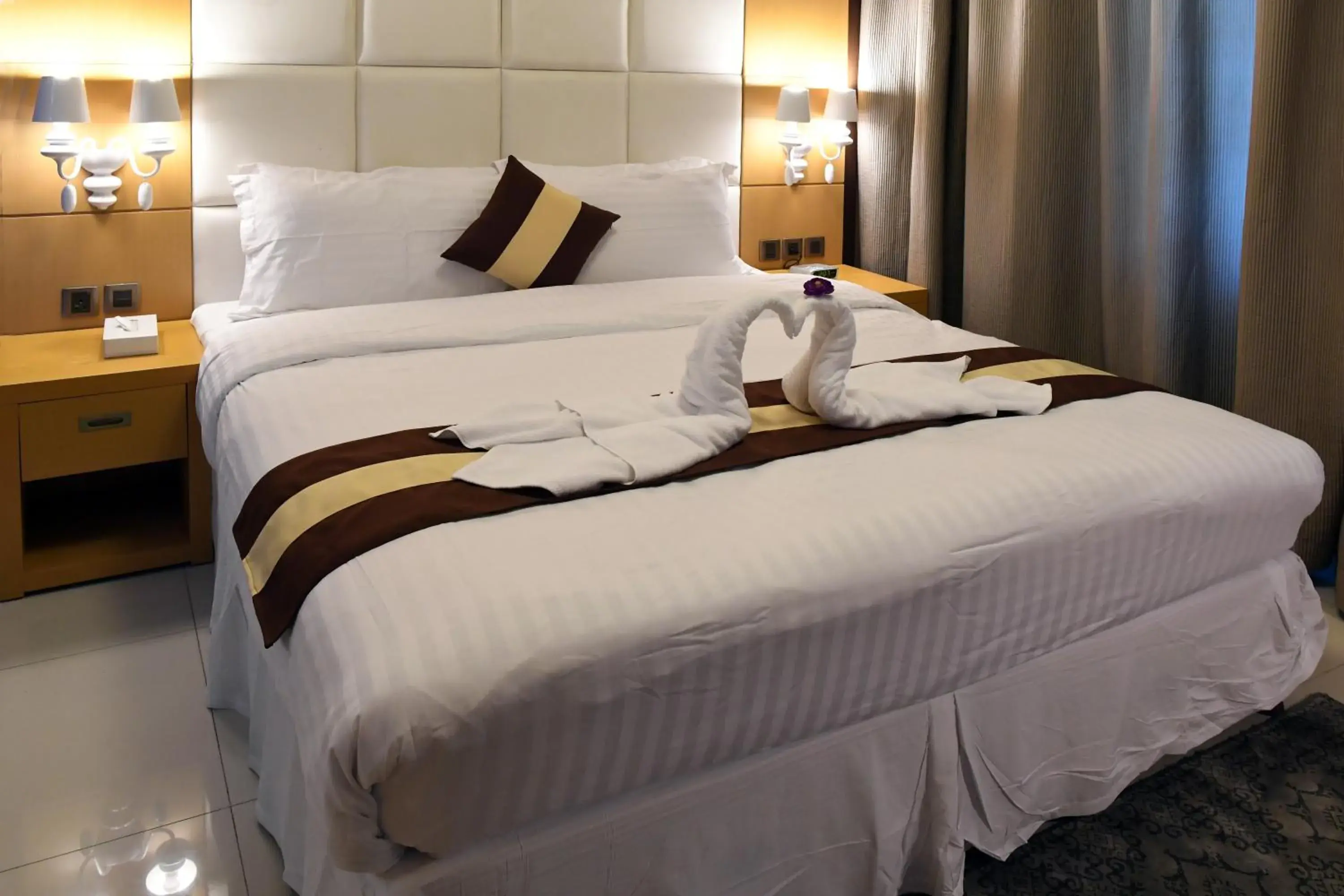 Bed, Room Photo in Al Olaya Suites Hotel