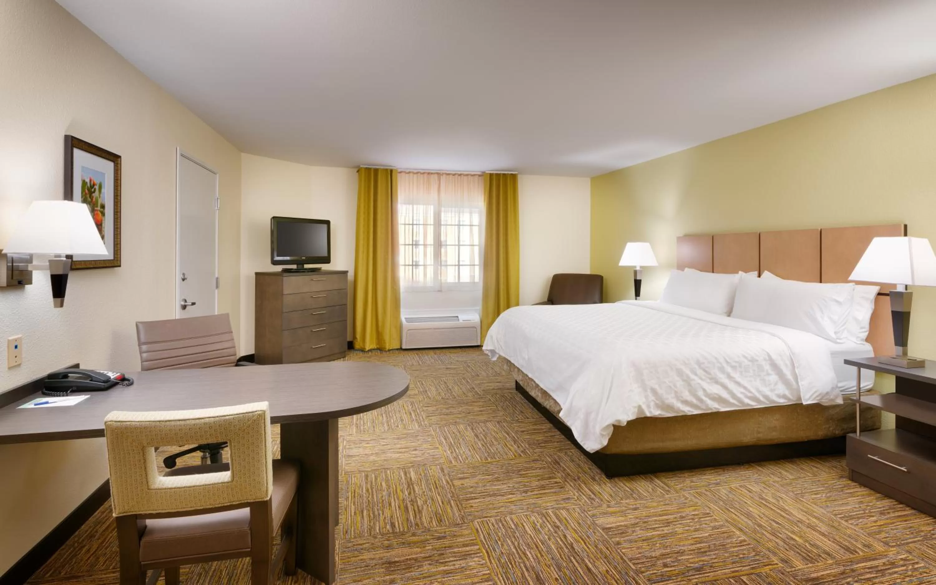 Photo of the whole room, Bed in Candlewood Suites Plano East by IHG