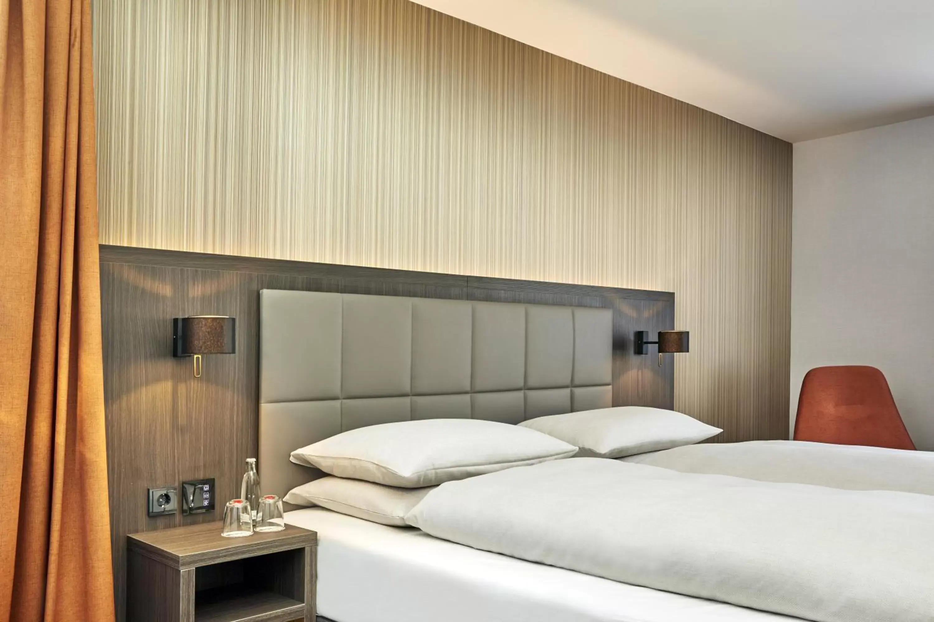 Decorative detail, Bed in H4 Hotel Residenzschloss Bayreuth Decorative detail, Bed in H4 Hotel Residenzschloss Bayreuth