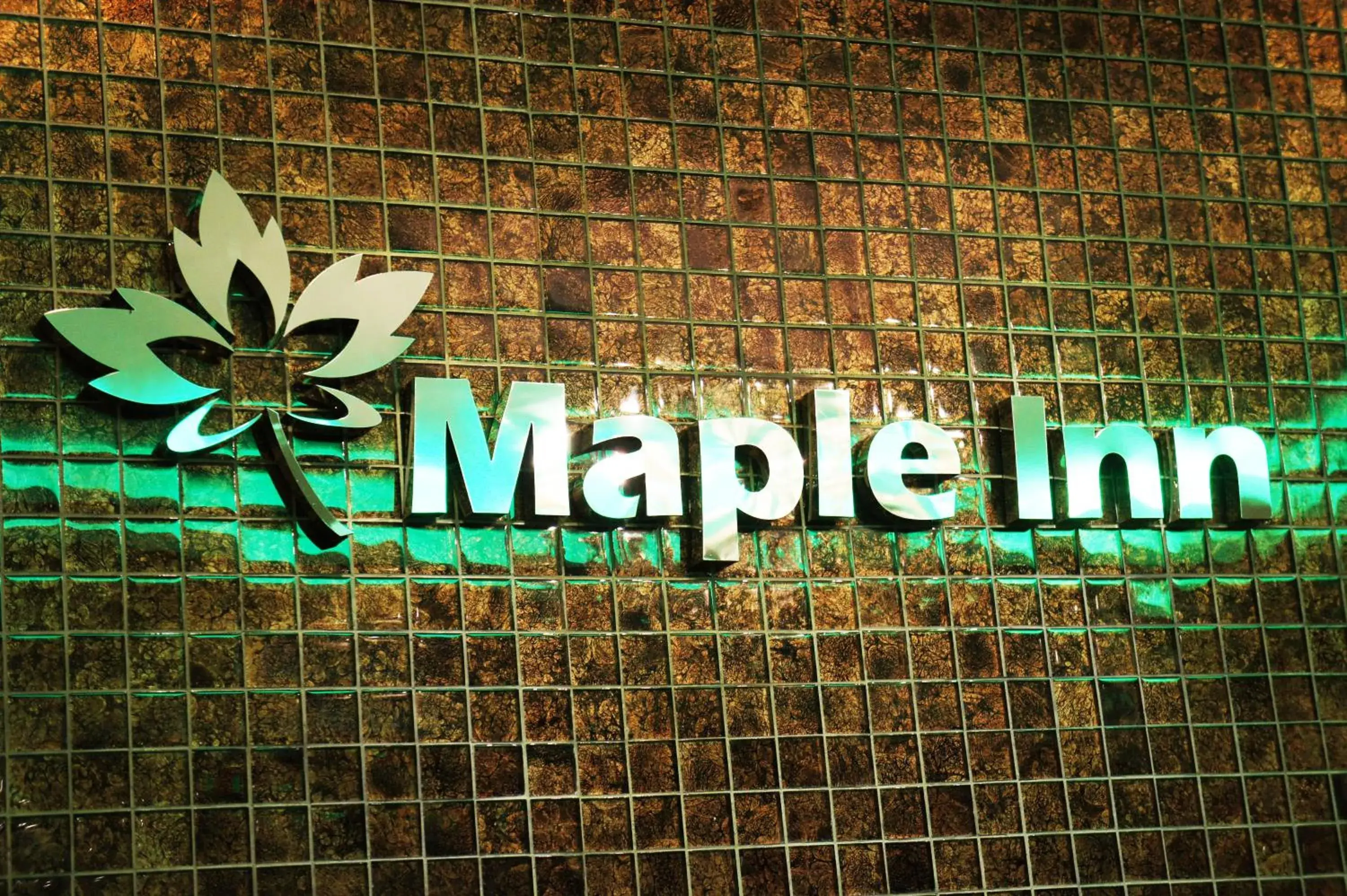 Property logo or sign in Maple Inn