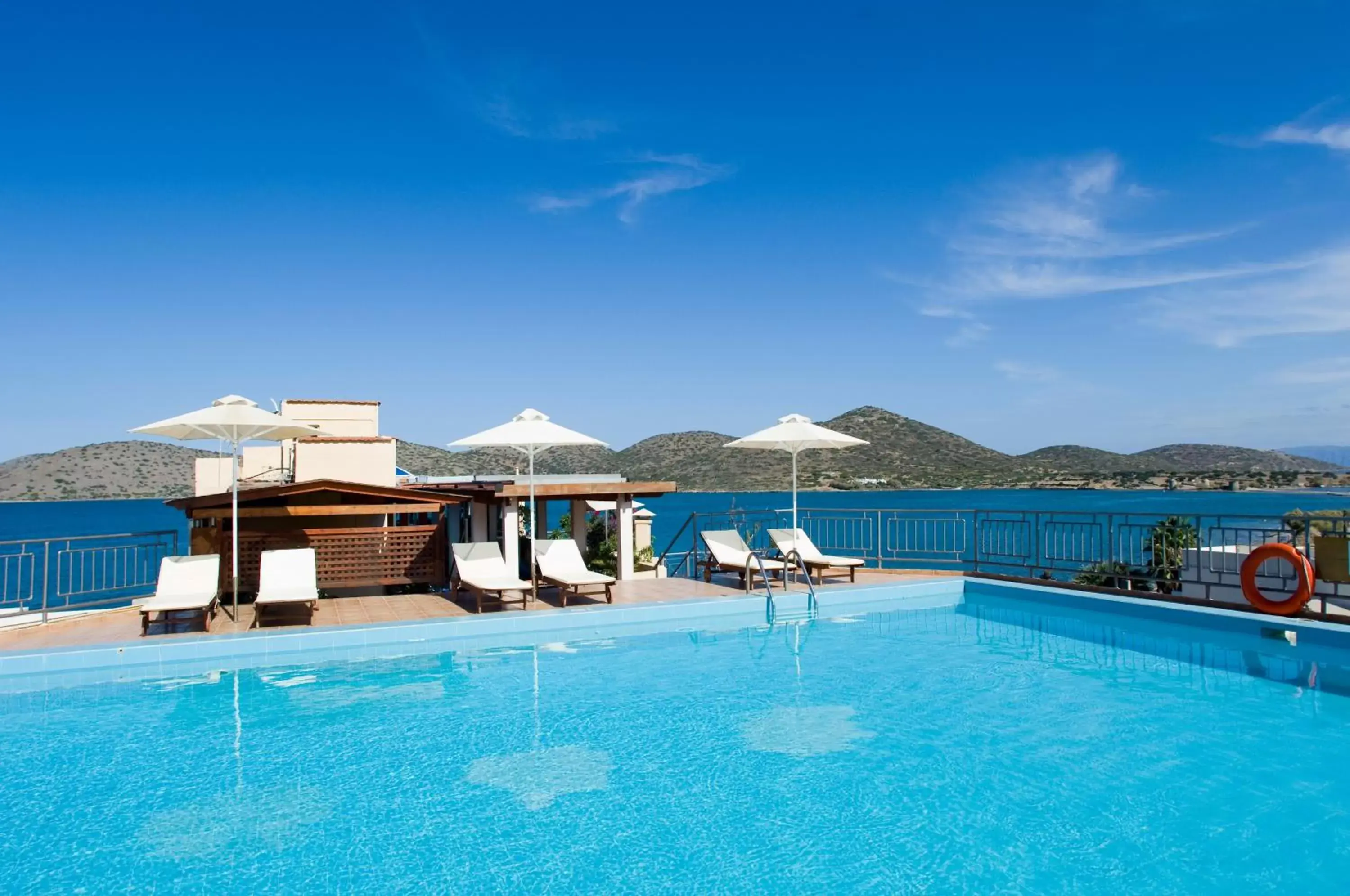 Balcony/Terrace, Swimming Pool in Elounda Akti Olous (Adults Only)