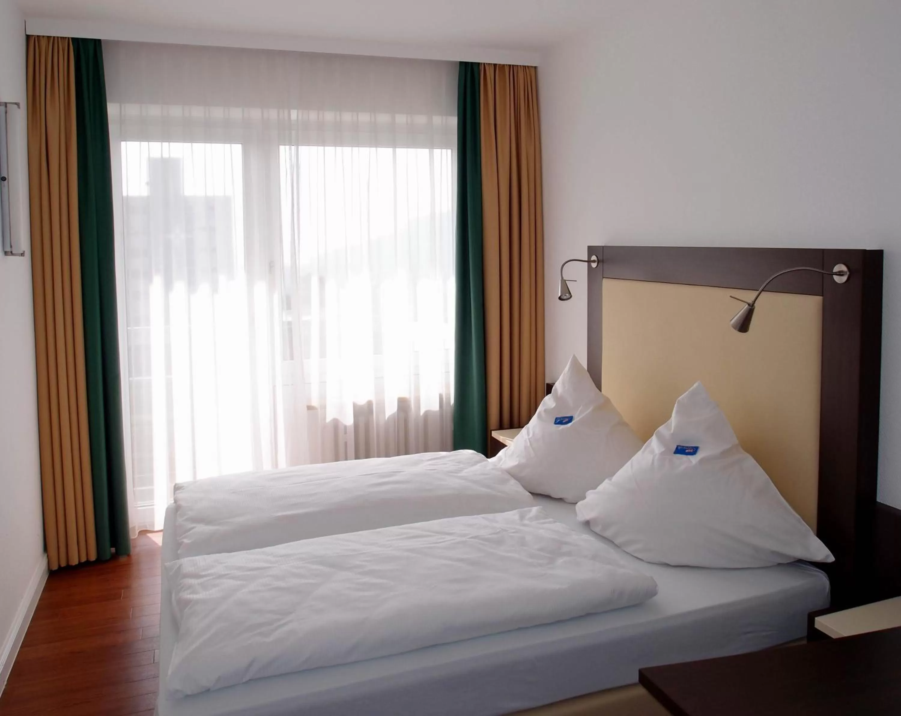 Photo of the whole room, Bed in Gästehaus am Räuschenberg