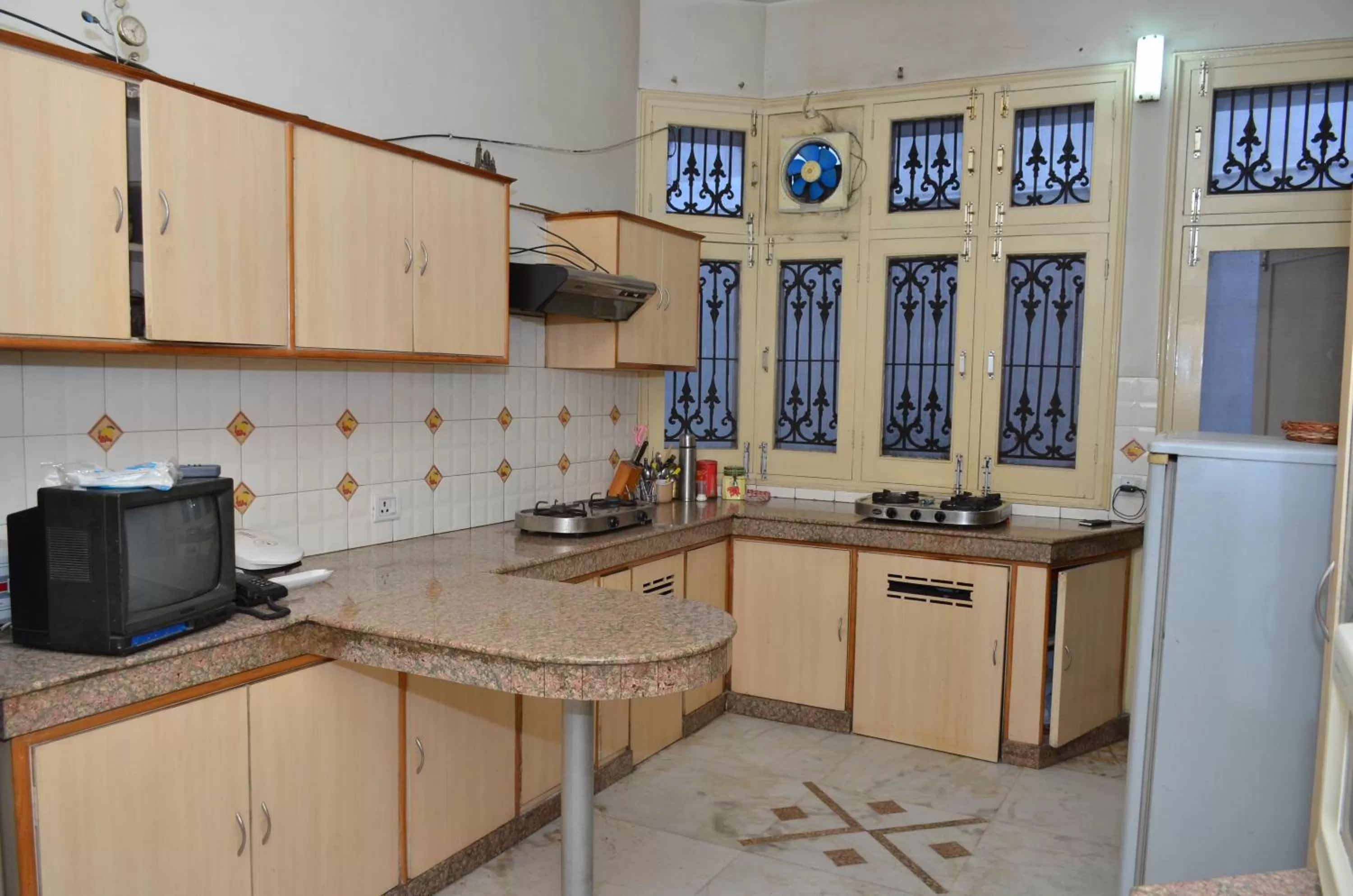 Kitchen or kitchenette in Sandy's Homestay