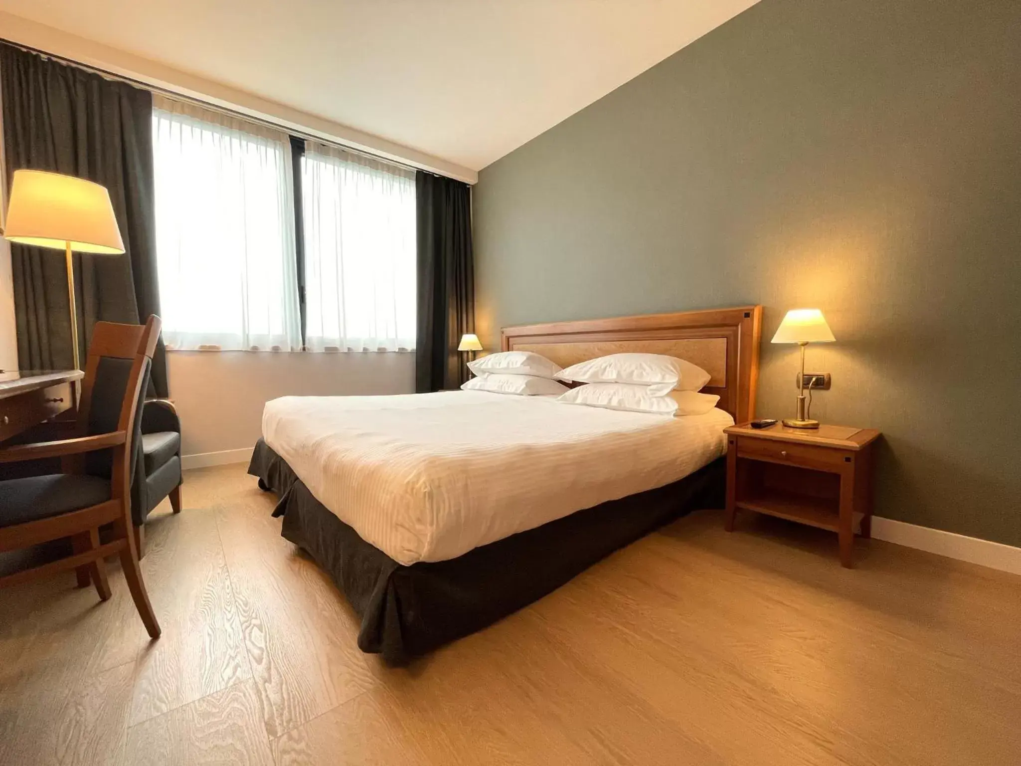 Photo of the whole room, Bed in Crowne Plaza Milan Linate, an IHG Hotel