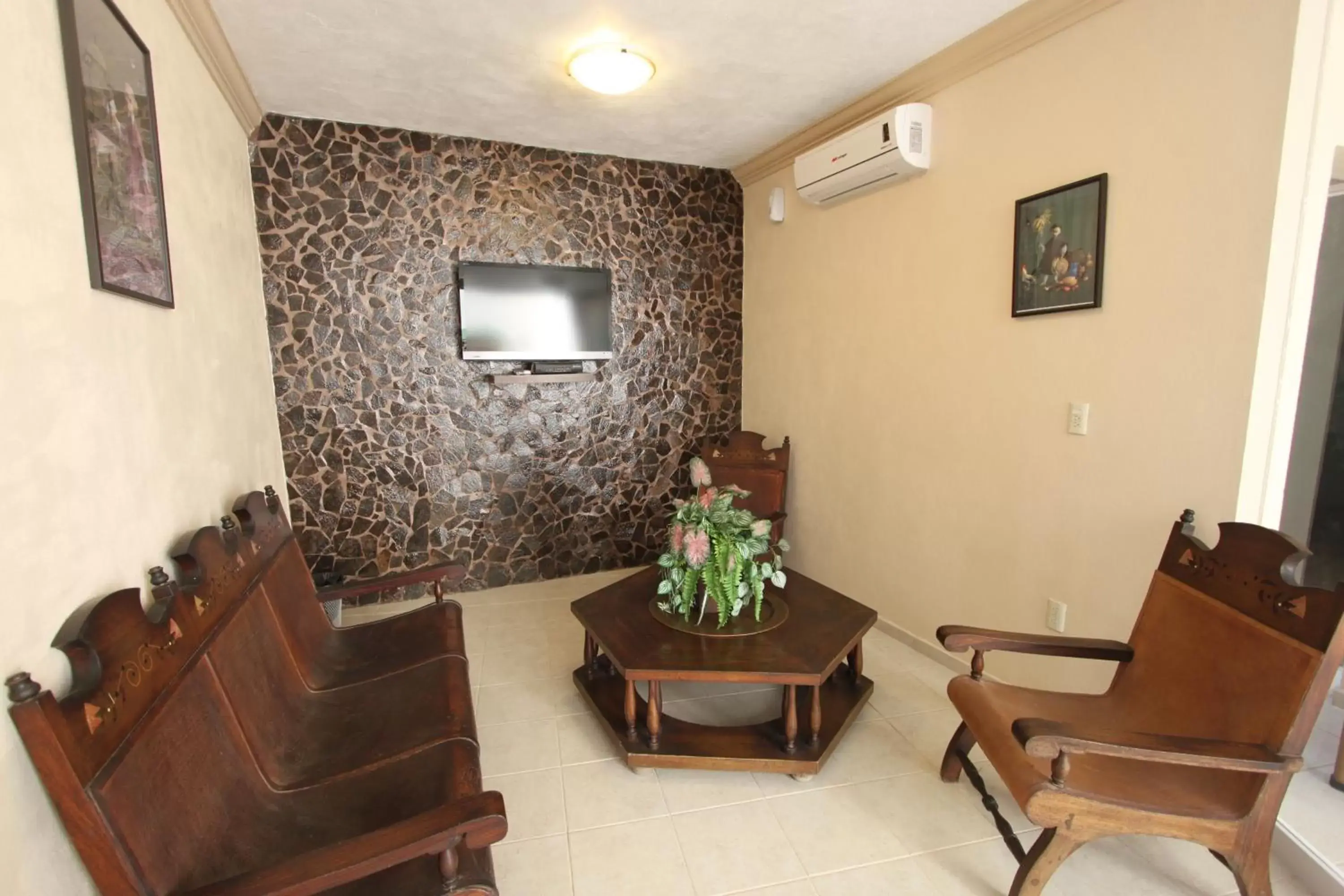 Communal lounge/ TV room, Seating Area in Hotel La Merced