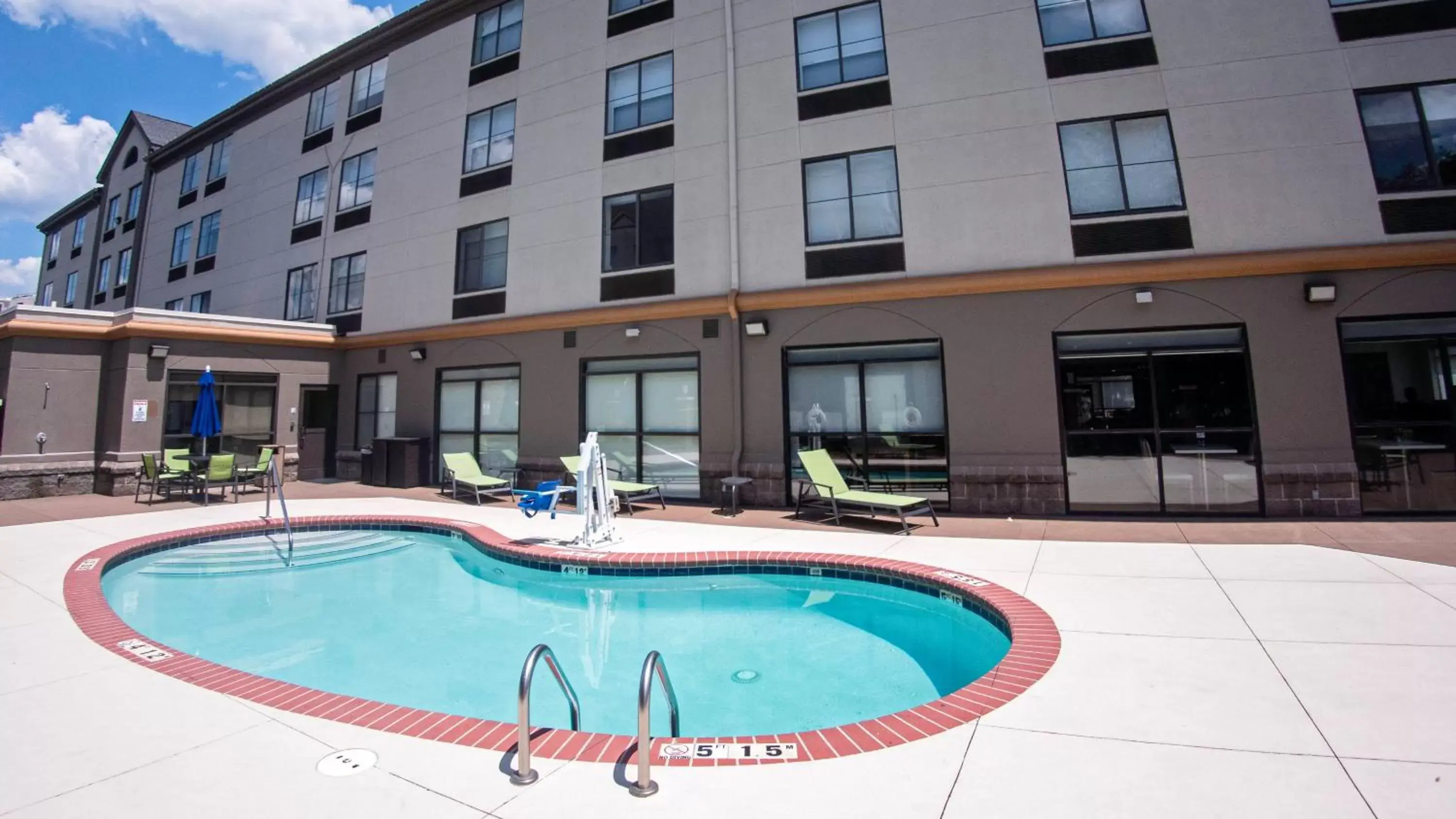 Swimming Pool in Holiday Inn Express & Suites Charlotte-Concord-I-85, an IHG Hotel