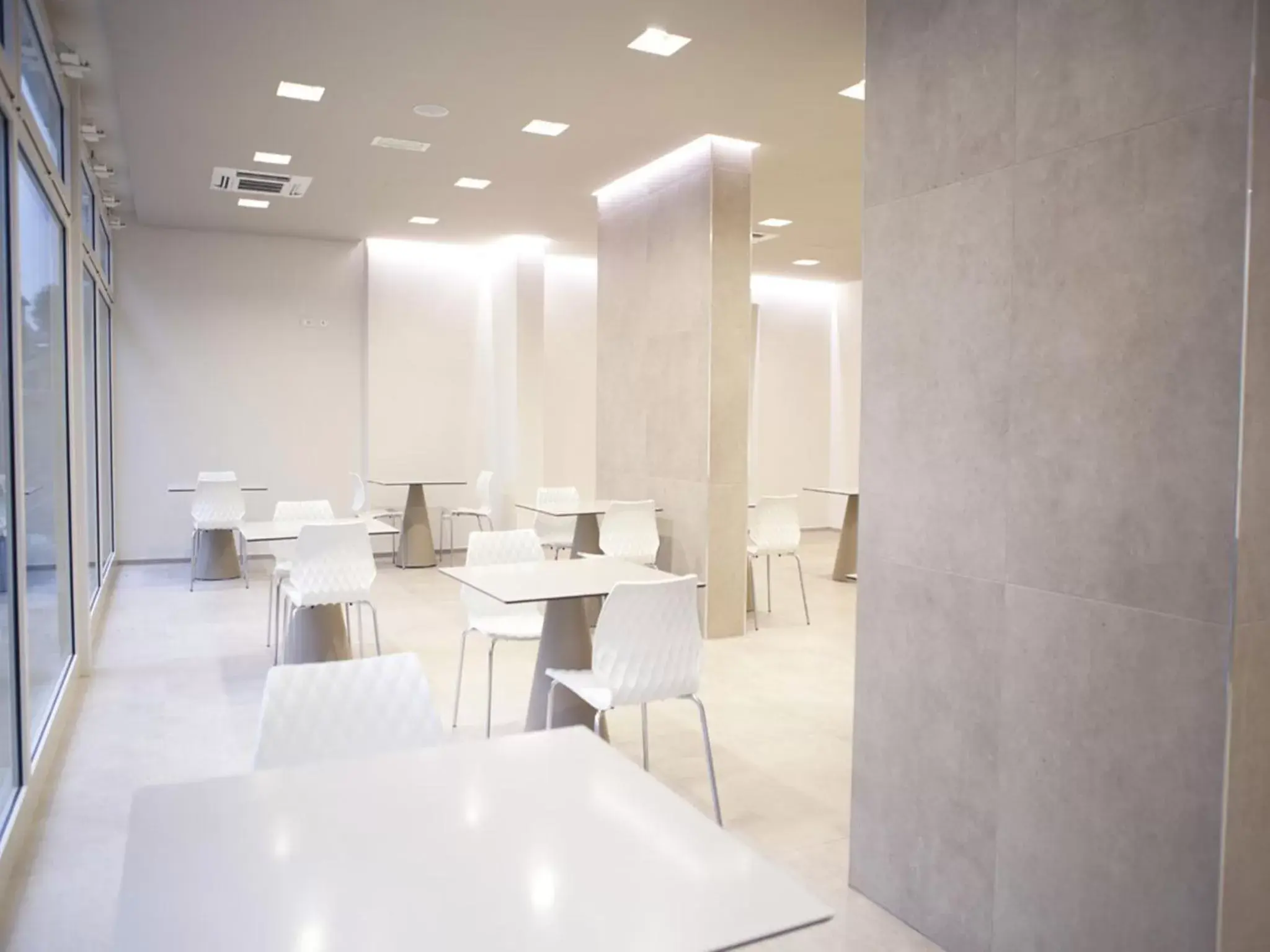 Lounge or bar in L'Hotel Lounge or bar in L'Hotel