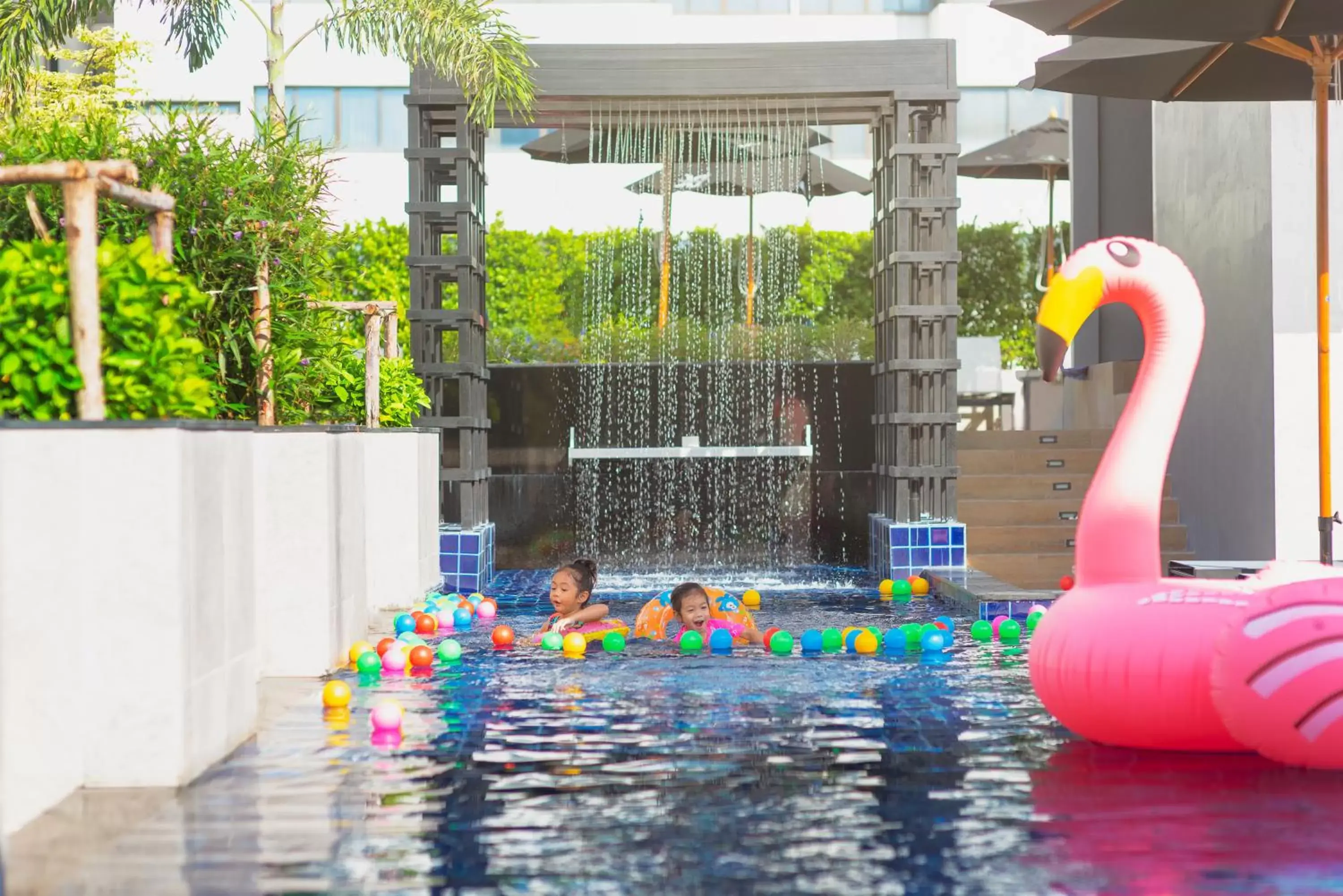 Swimming pool, Children's Play Area in Eleven Hotel Bangkok Sukhumvit 11