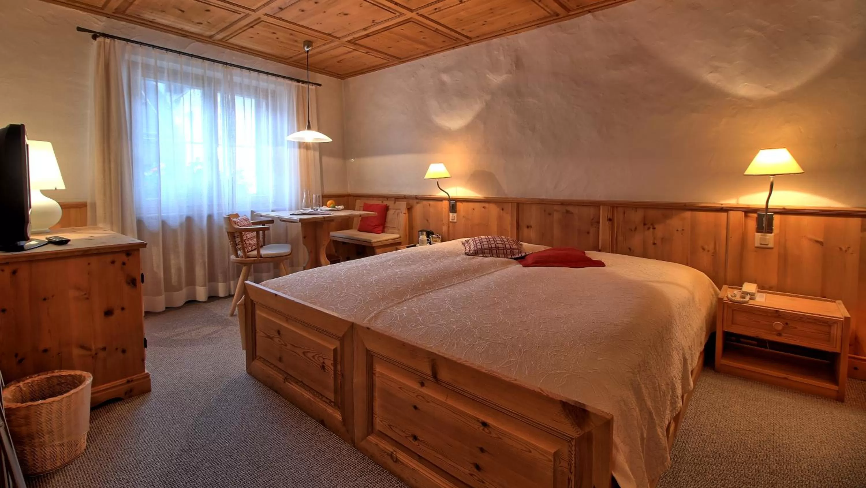 Bed in Hotel Engiadina